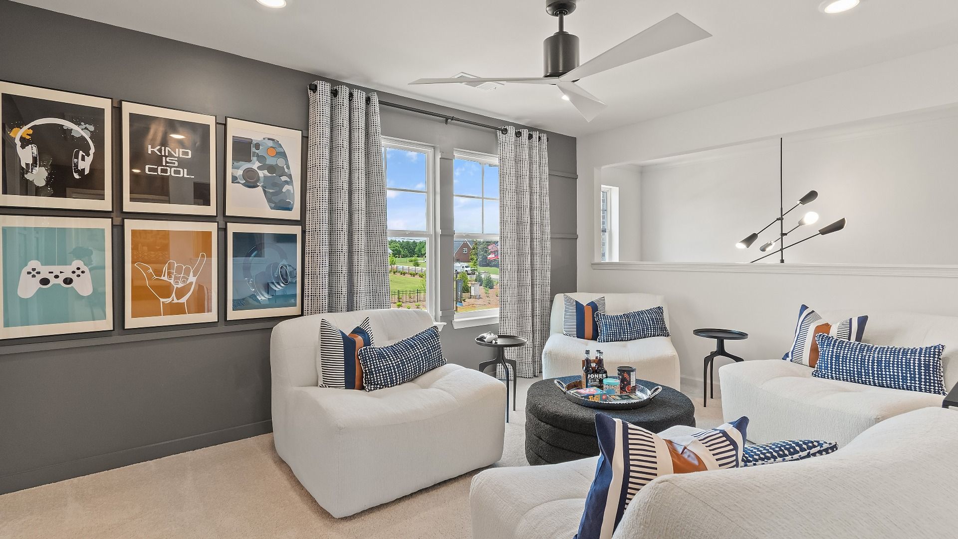 Versatile loft living space with natural light at Grandview at Millers Mill in Stockbridge, GA.