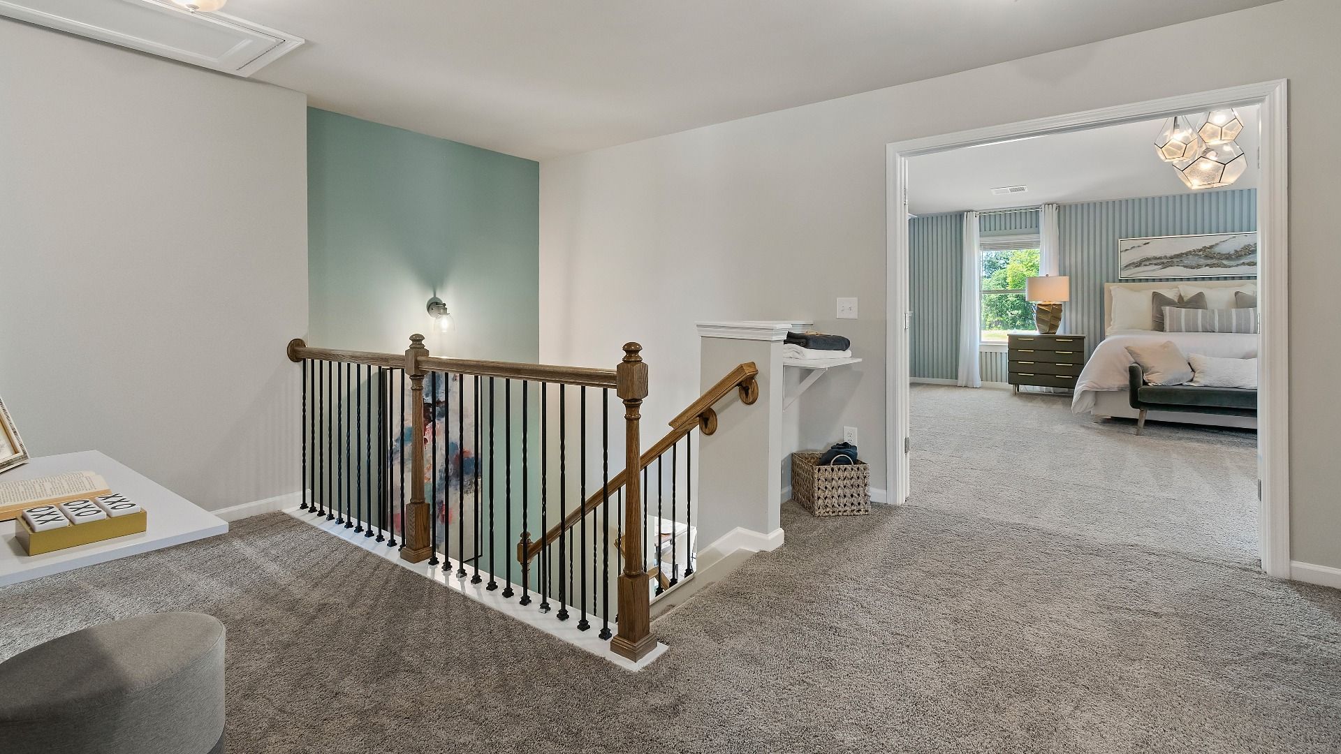 Everest III upstairs landing leading into open area with carpet flooring at Berkeley Lakes in Locust Grove, GA.