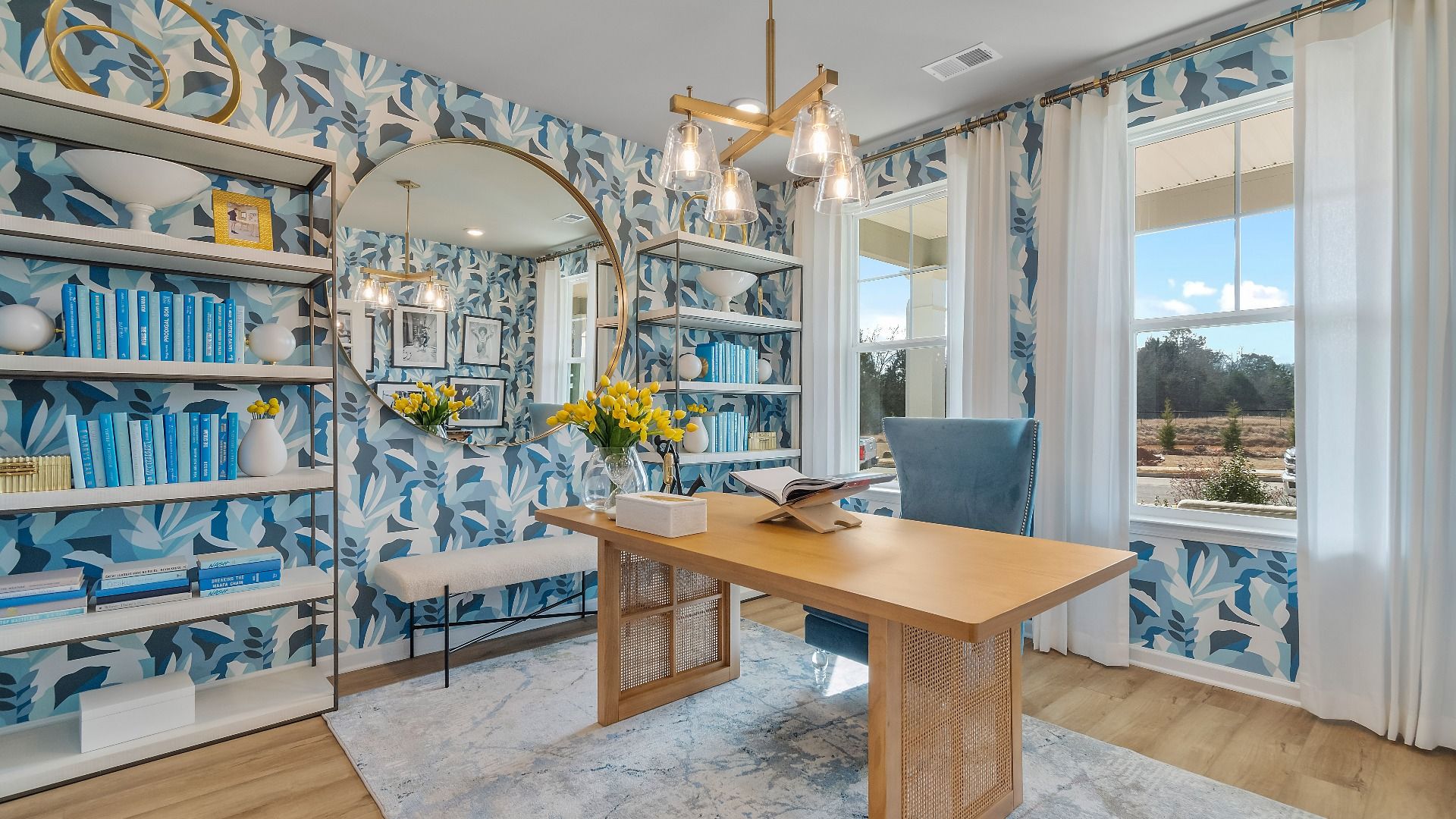 First-floor home office space with large windows in new construction single family home in McDonough, GA.