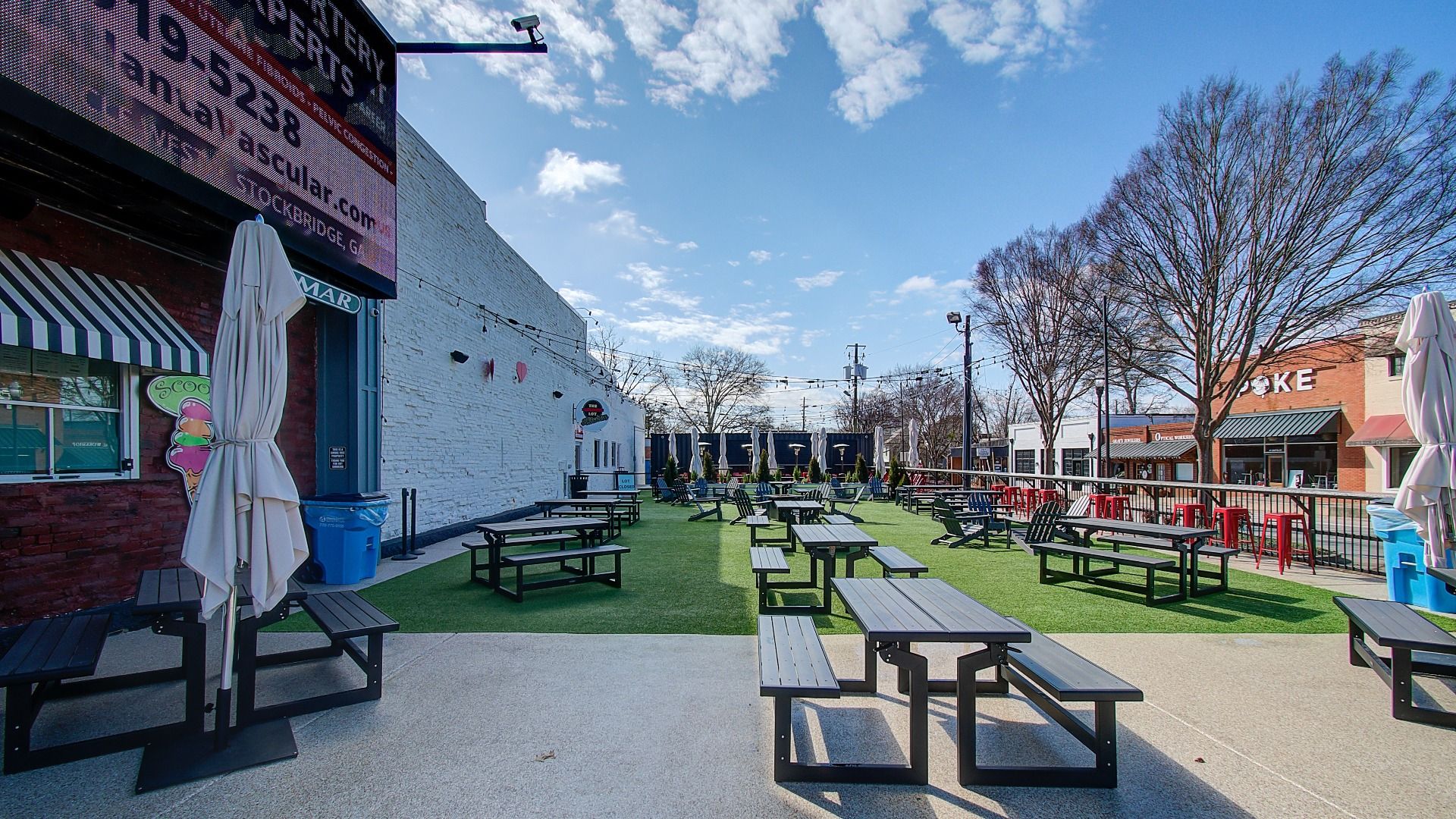 Popular ice cream shop, Scoops, with greenspace in Downtown McDonough Square.