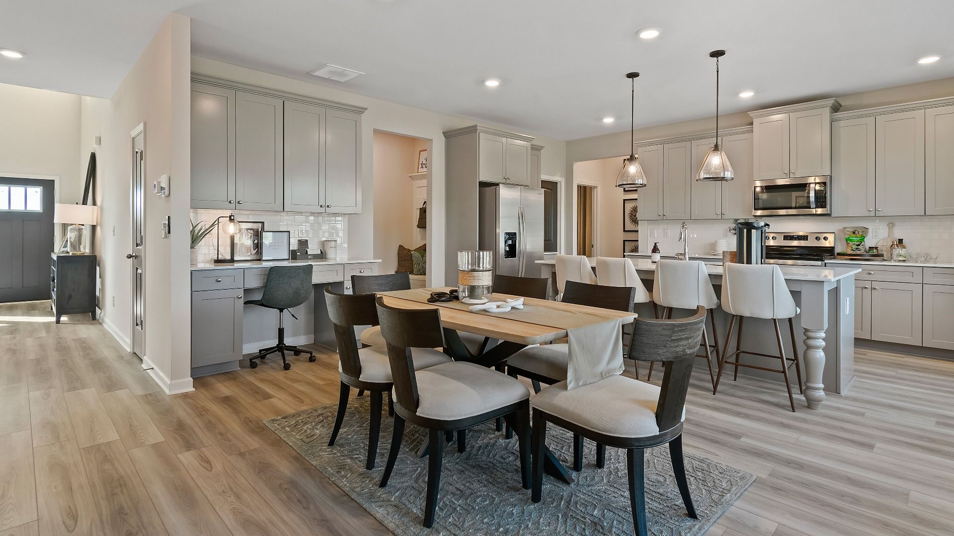 Eat-in breakfast area with bright windows and contemporary finishes in new construction home at Adagio in Dacula, GA.