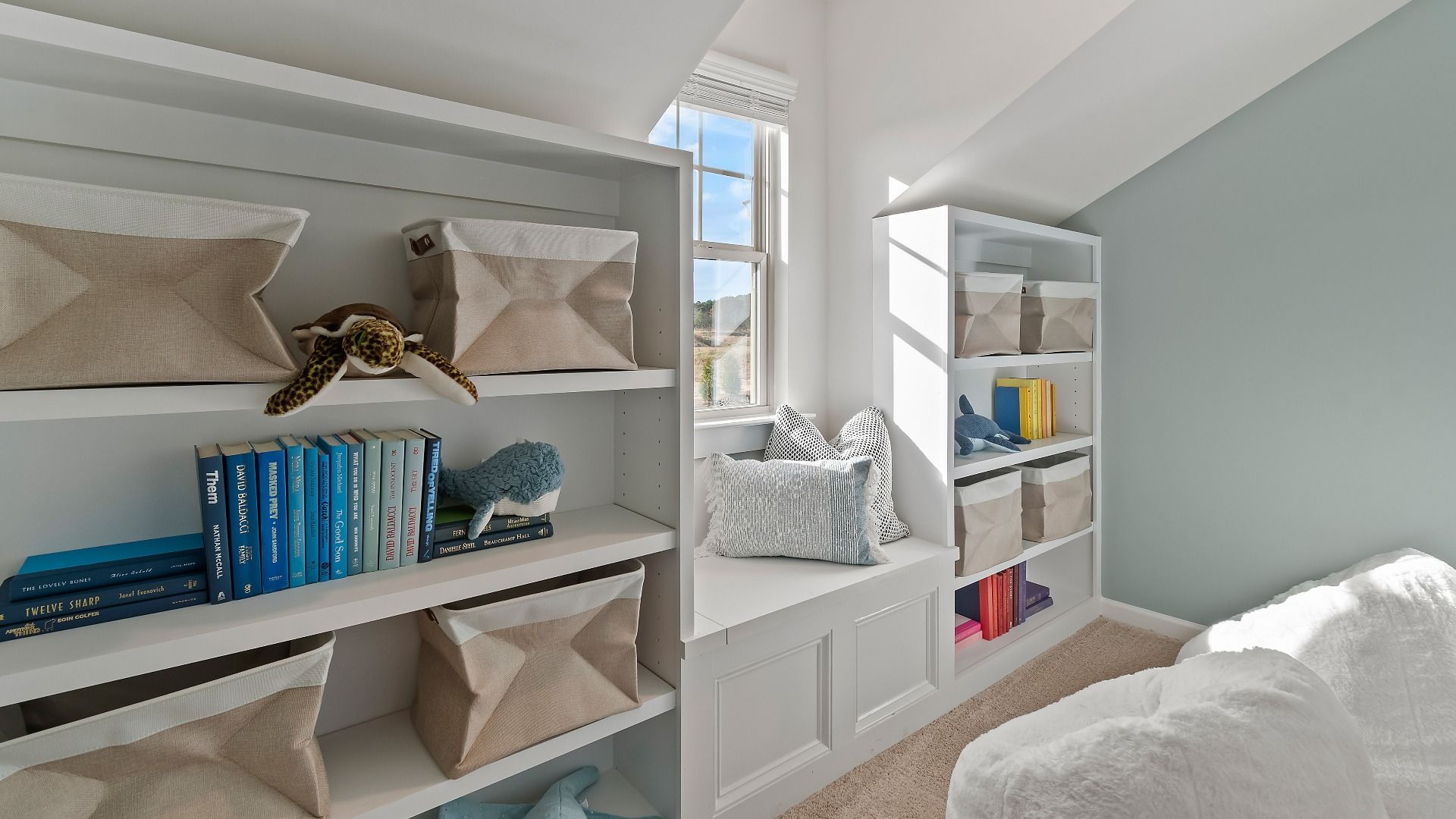 Versatile flex space with large window and natural light in new construction home at Adagio in Dacula, GA.