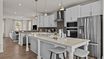 casa en Alexander Providence Townhomes por DRB Homes