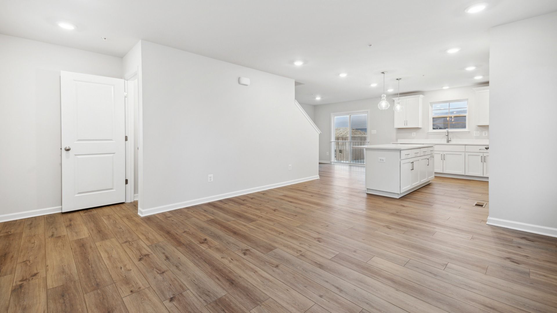 Open Concept Design Makes Entertaining a Breeze in the Whitehall at The Village of College Park by DRB Homes.
