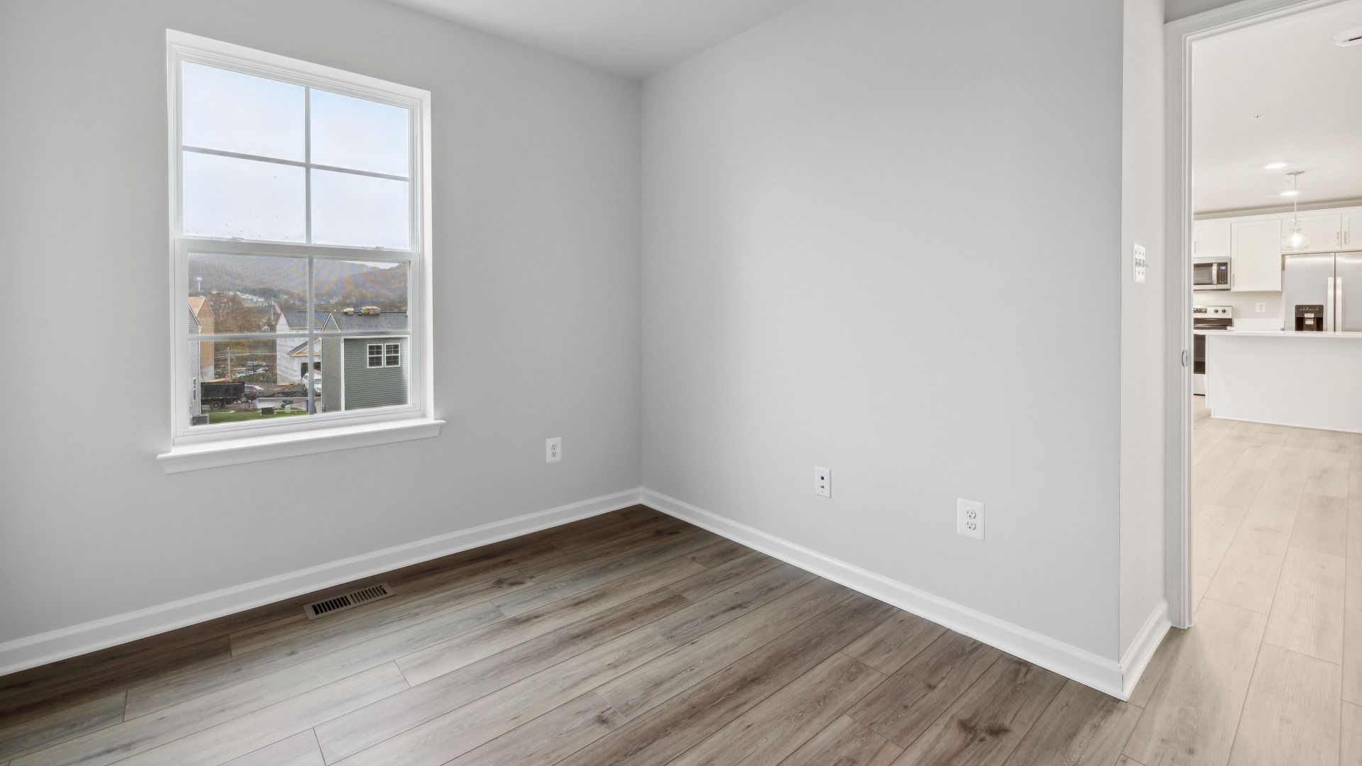 First Floor Flex Space is Perfect for a Home Office in the Whitehall at The Village of College Park by DRB Homes.