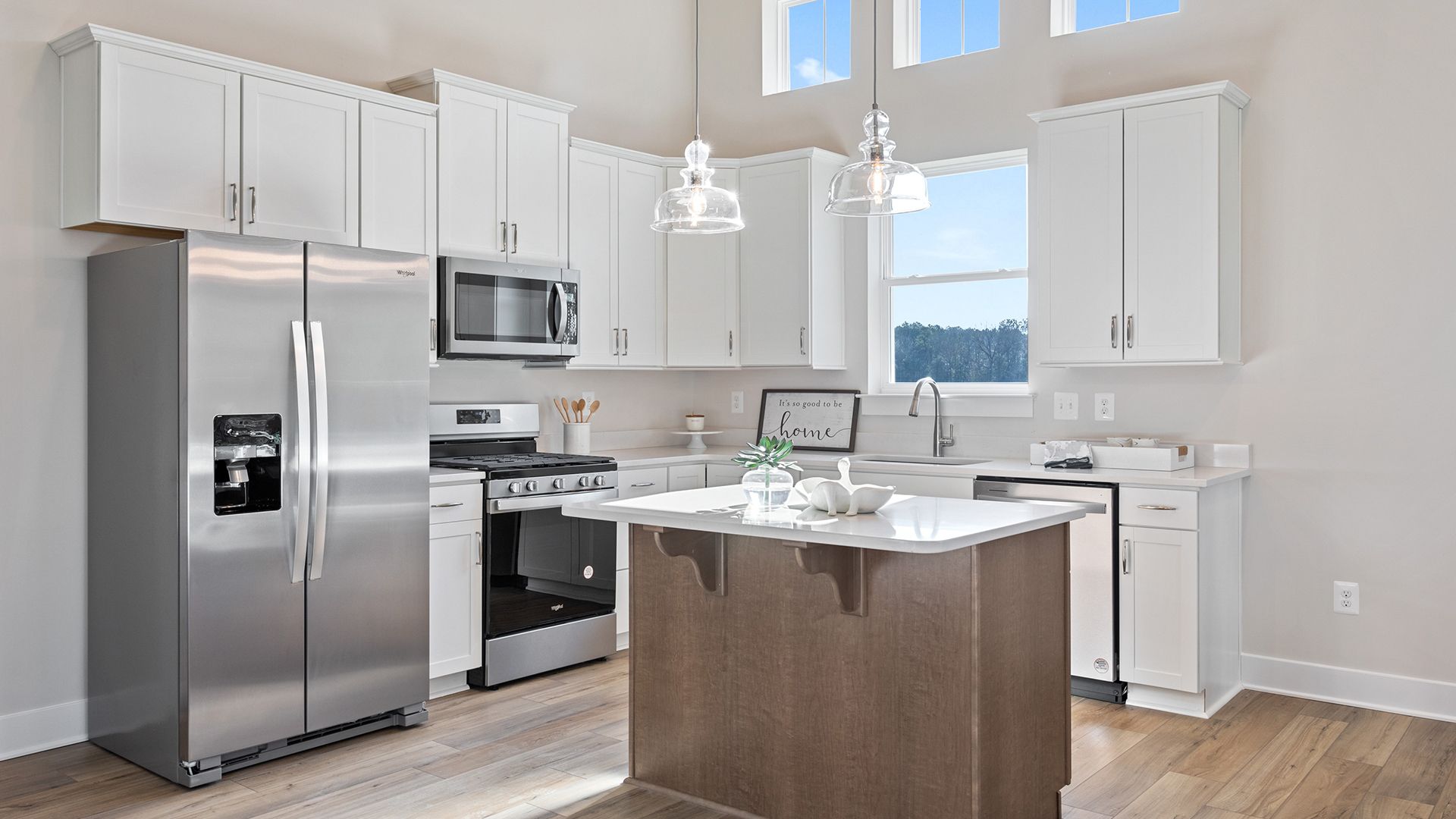 Sunlit Kitchen with Stainless Steel Appliances in the Aloha at Wetherby in Millsboro, DE