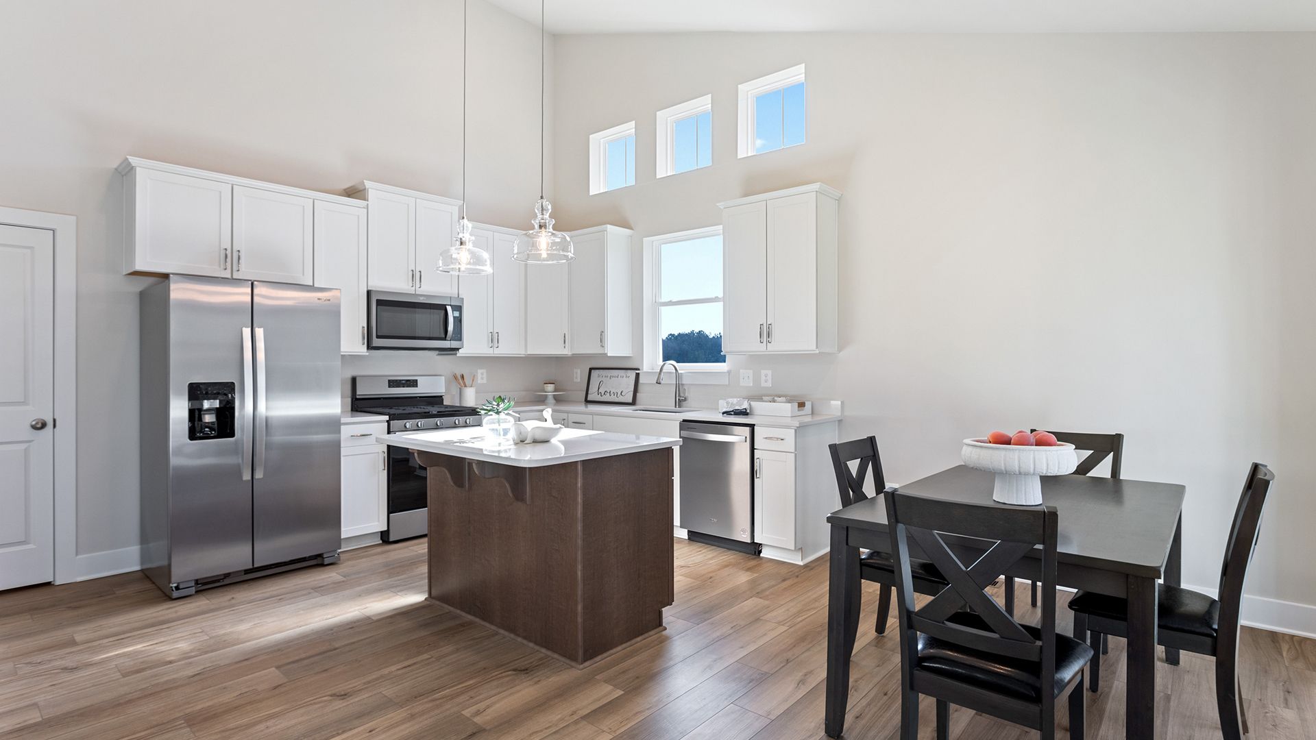 Sunlit Kitchen with Stainless Steel Appliances in the Aloha at Wetherby in Millsboro, DE
