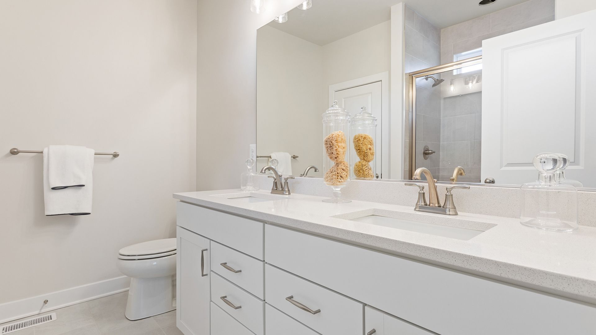 Owner's Bath Dual Sink Vanity with Quartz in the Aloha at Wetherby in Millsboro, DE