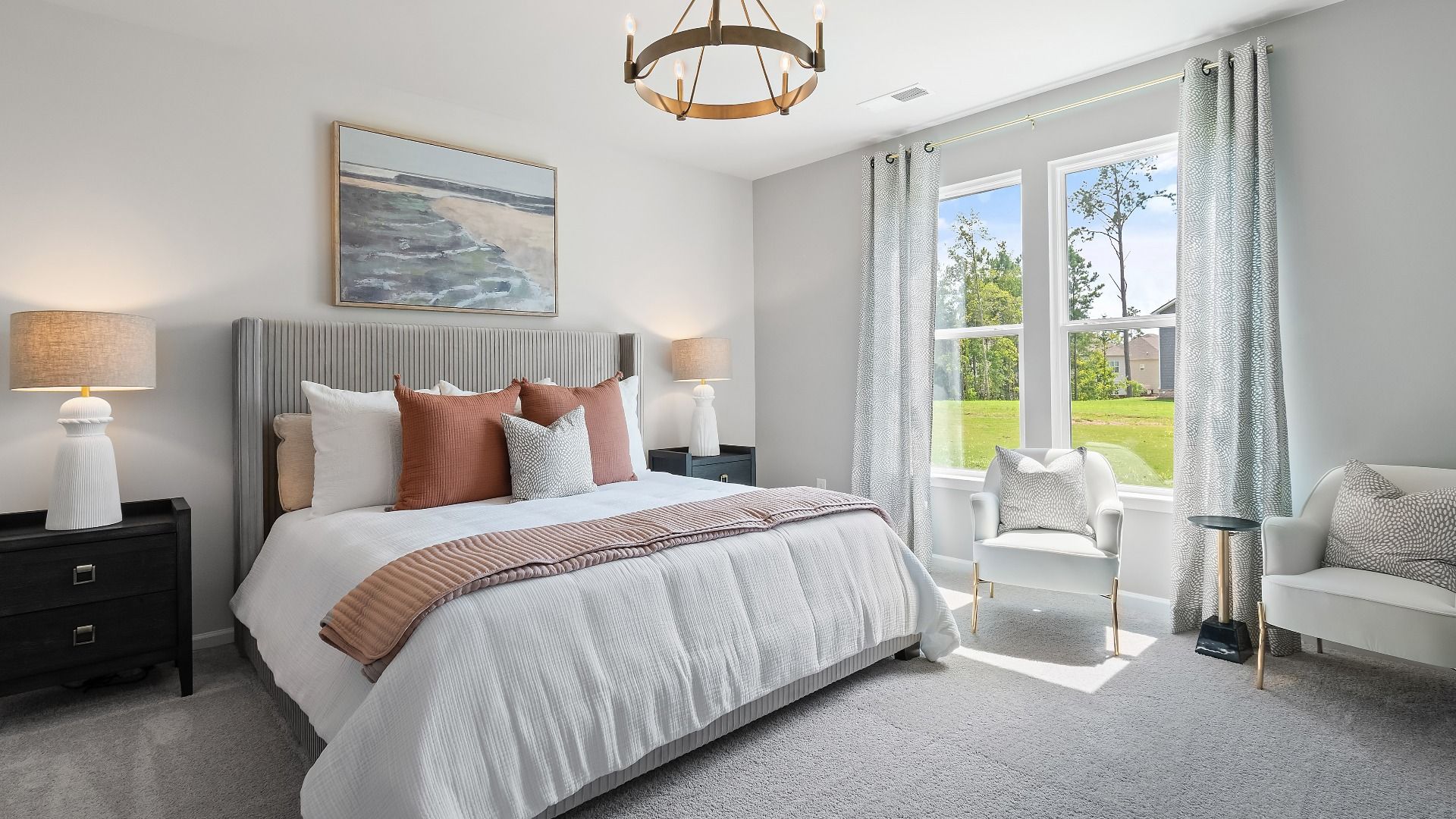 Spacious private suite with carpet flooring, natural light, and neutral color palette at Westminster in Covington, GA.