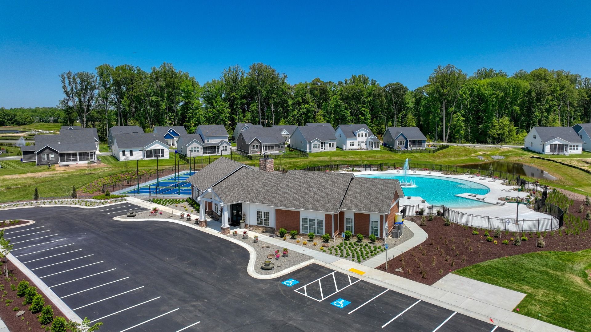 Pool and clubhouse at the DRB Homes community of Chase Oaks in Lewes, Delaware.