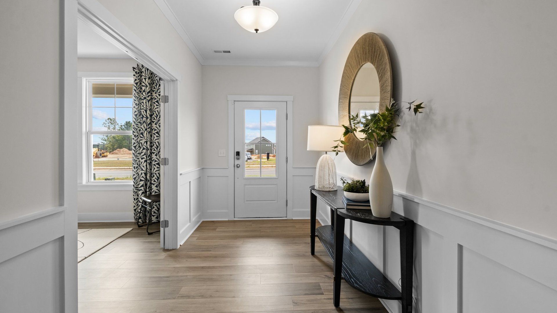 Wide and inviting entrance with easy access to the study. Jordan plan at Lakeside Glen in York, SC by DRB Homes