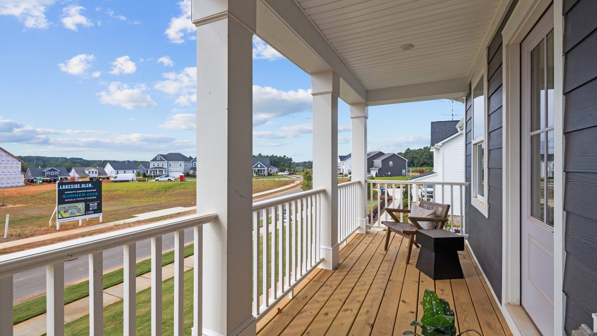 Unwind in style in The Jordan plan's tranquil and private covered balcony. Lakeside Glen. DRB Homes. York, SC.