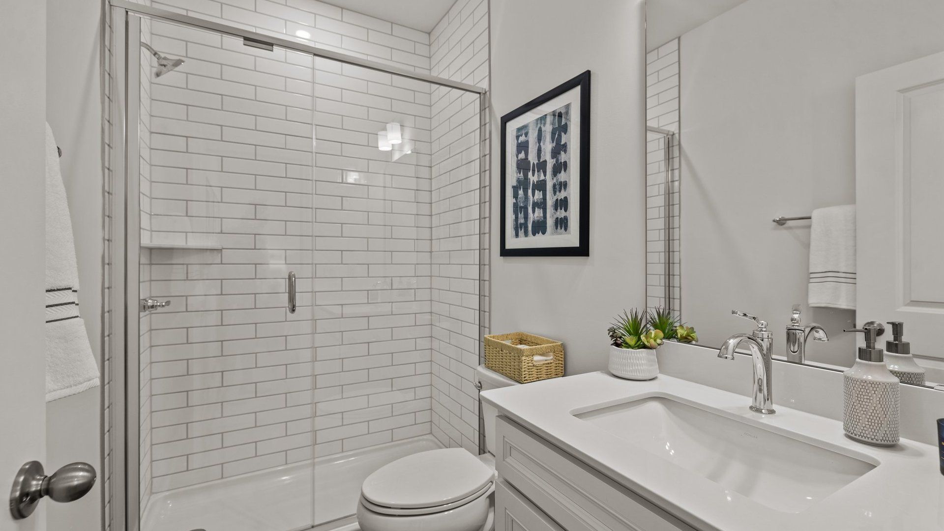 Secondary full bathroom with walk-in shower and fully tiled shower wall, in the Townsend Design by DRB Homes in York, SC