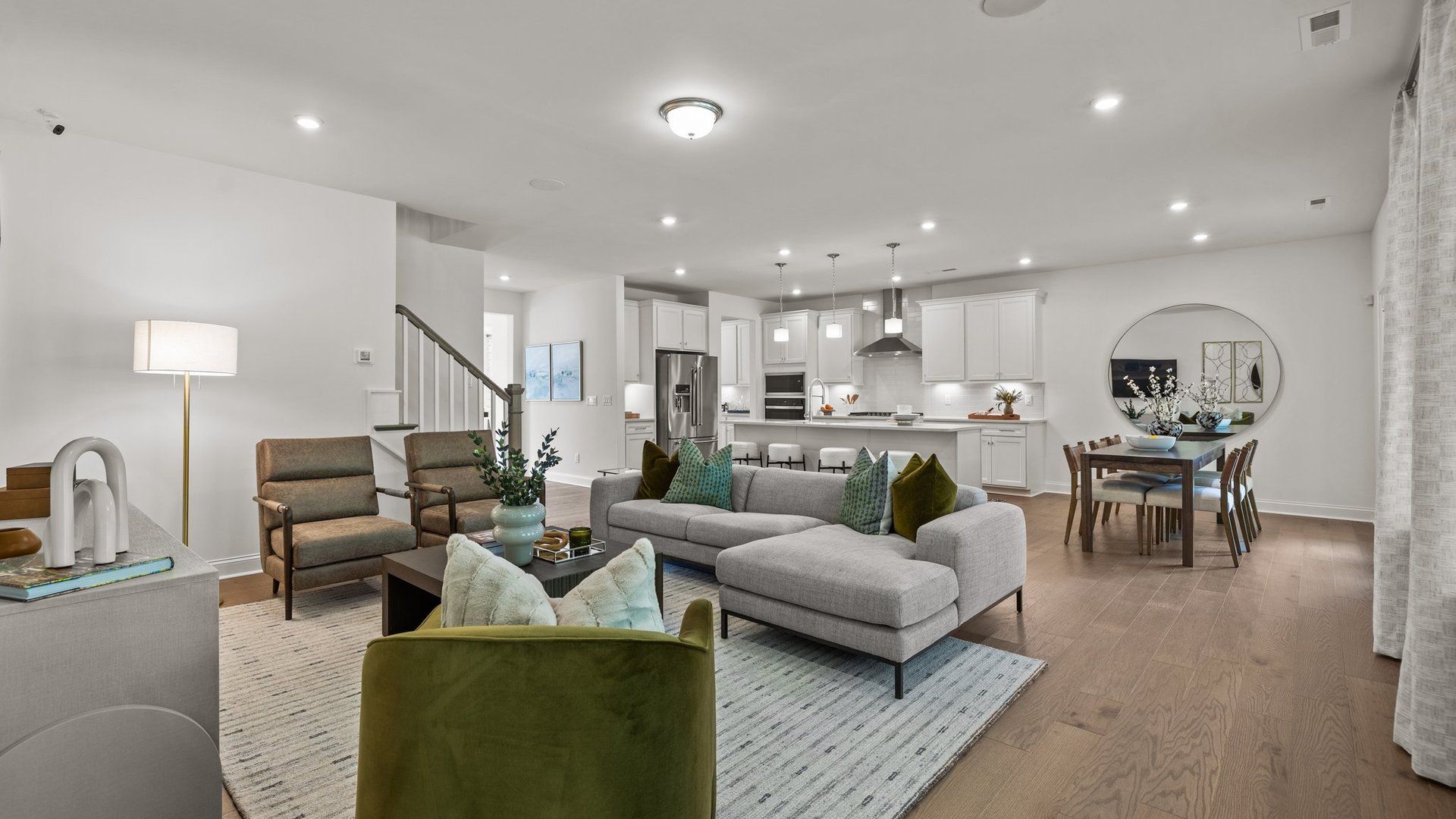 Inviting family room and gourmet kitchen in the two-story single family Townsend plan by DRB Homes in York, SC.