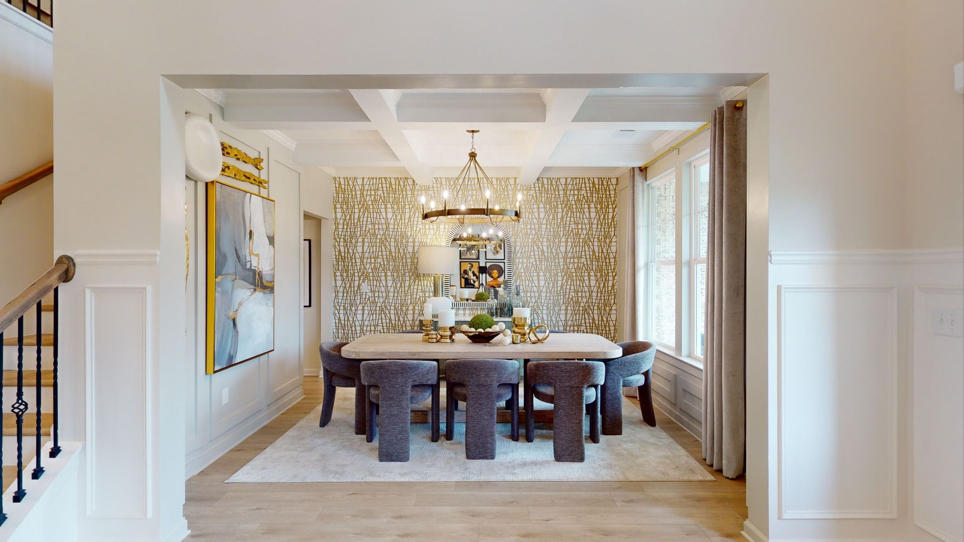 Elegant dining room with large windows and coffered ceiling at Trinity Park in McDonough, GA.