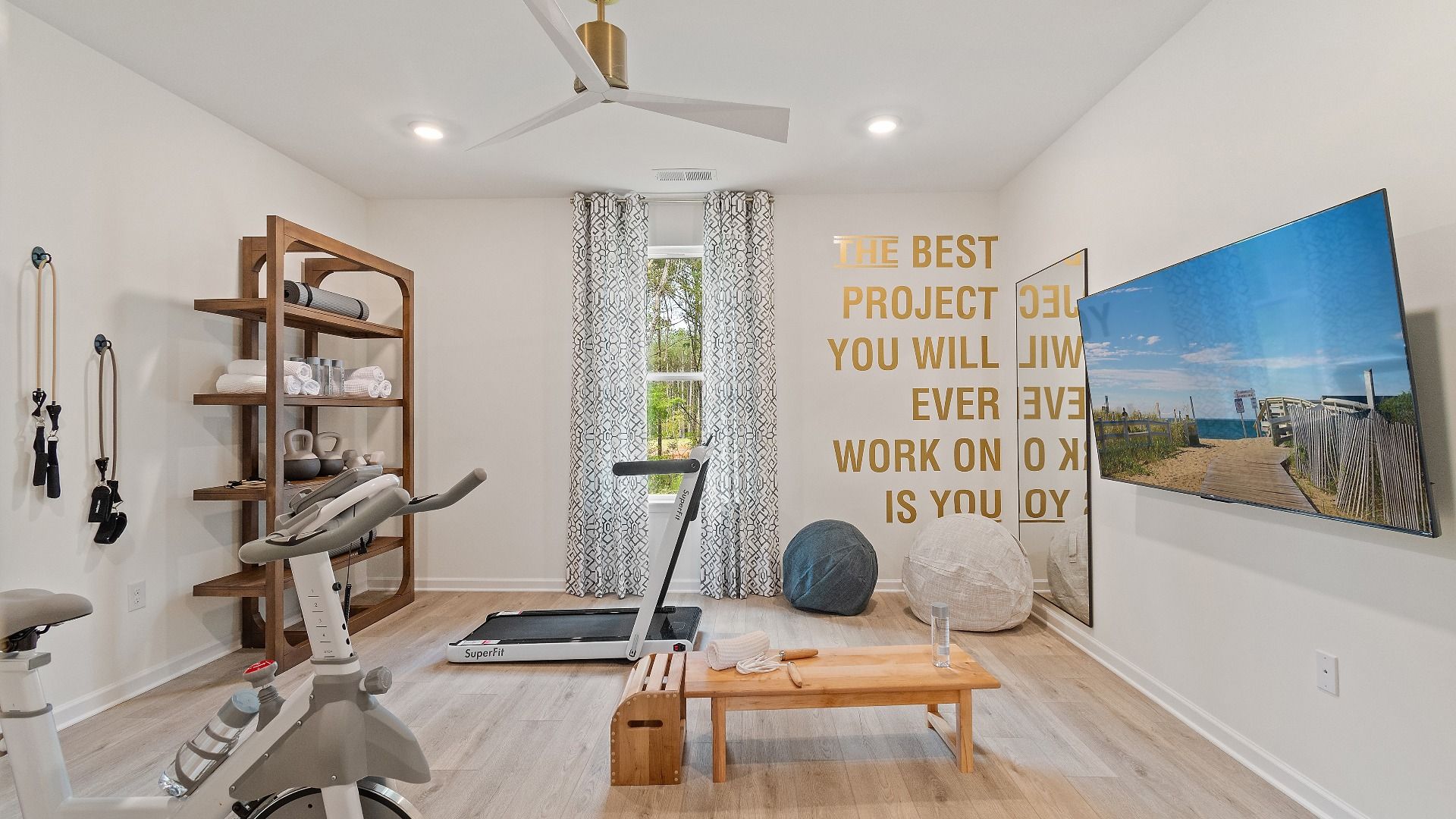 Spacious secondary bedroom or flex space with window for natural light and LVP floors at Trinity Park in McDonough, GA.