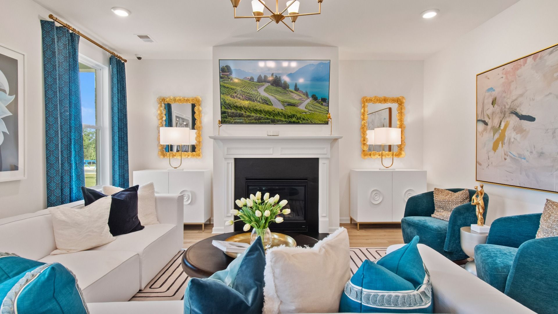 Bright modern family room with LVP flooring, gas fireplace, and natural light in the Wagener at Bowers Farm in McDonough, GA.