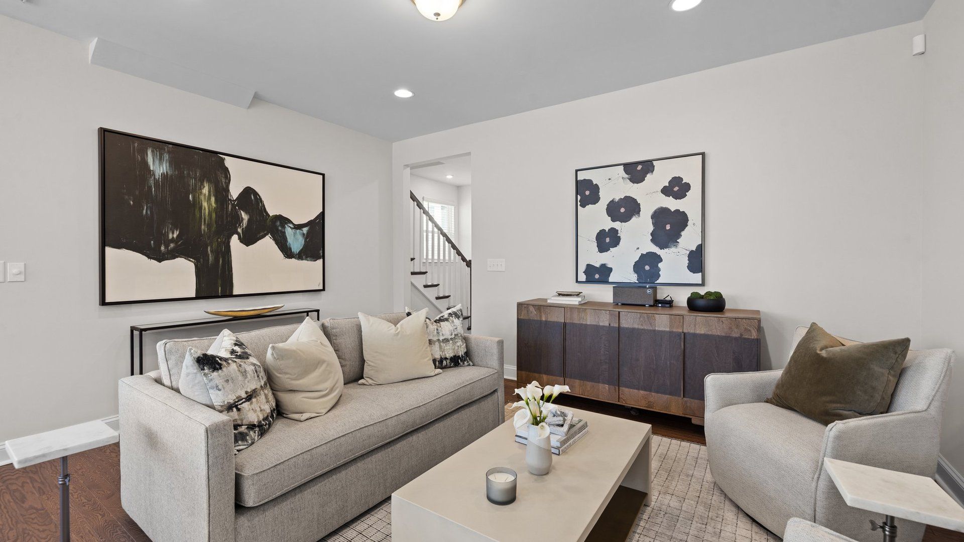 Family room with elevated ceiling and premium finishes at Greenway Overlook by DRB Homes Charlotte, NC