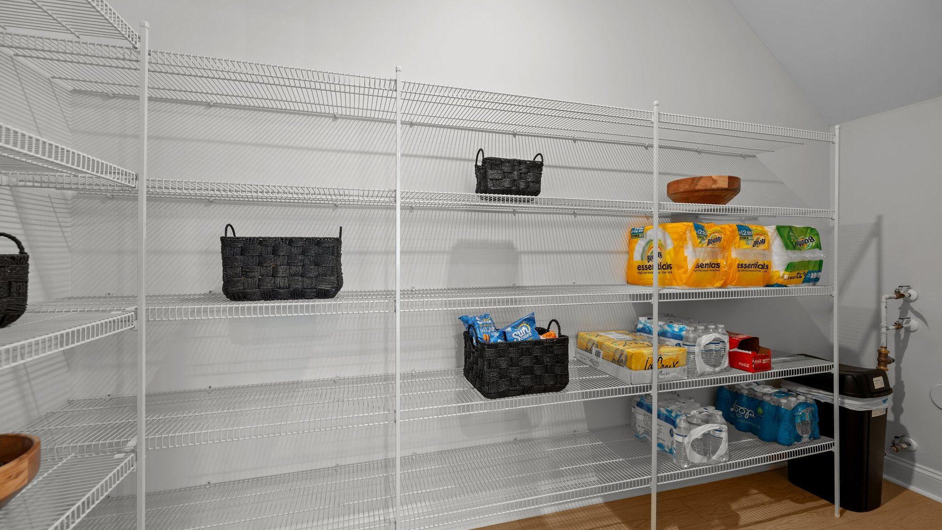 Spacious walk-in pantry with ventilated shelving in the Adaline plan by DRB Homes Charlotte, NC