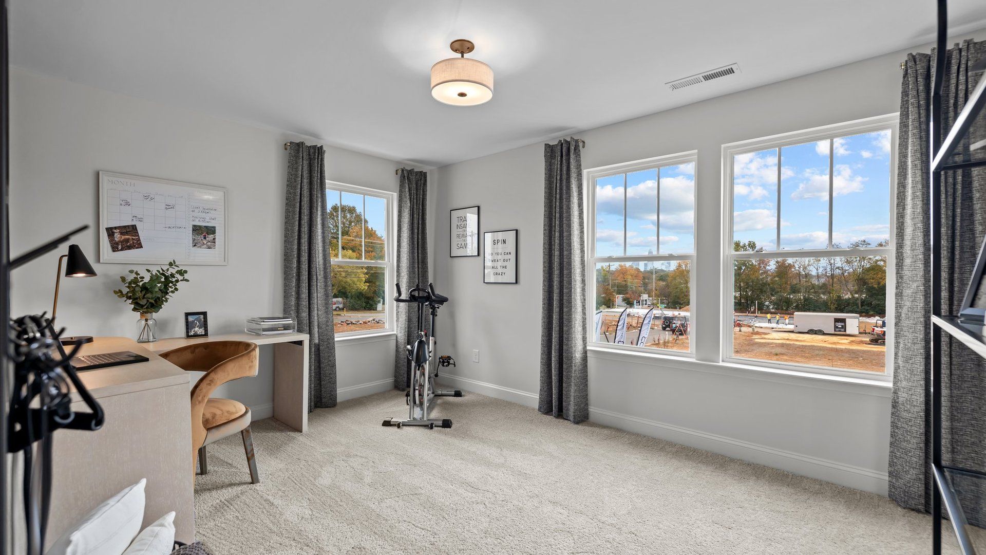 Flexible multi-purpose bedroom room with large windows, in the new Adaline Design by DRB Homes Charlotte, NC
