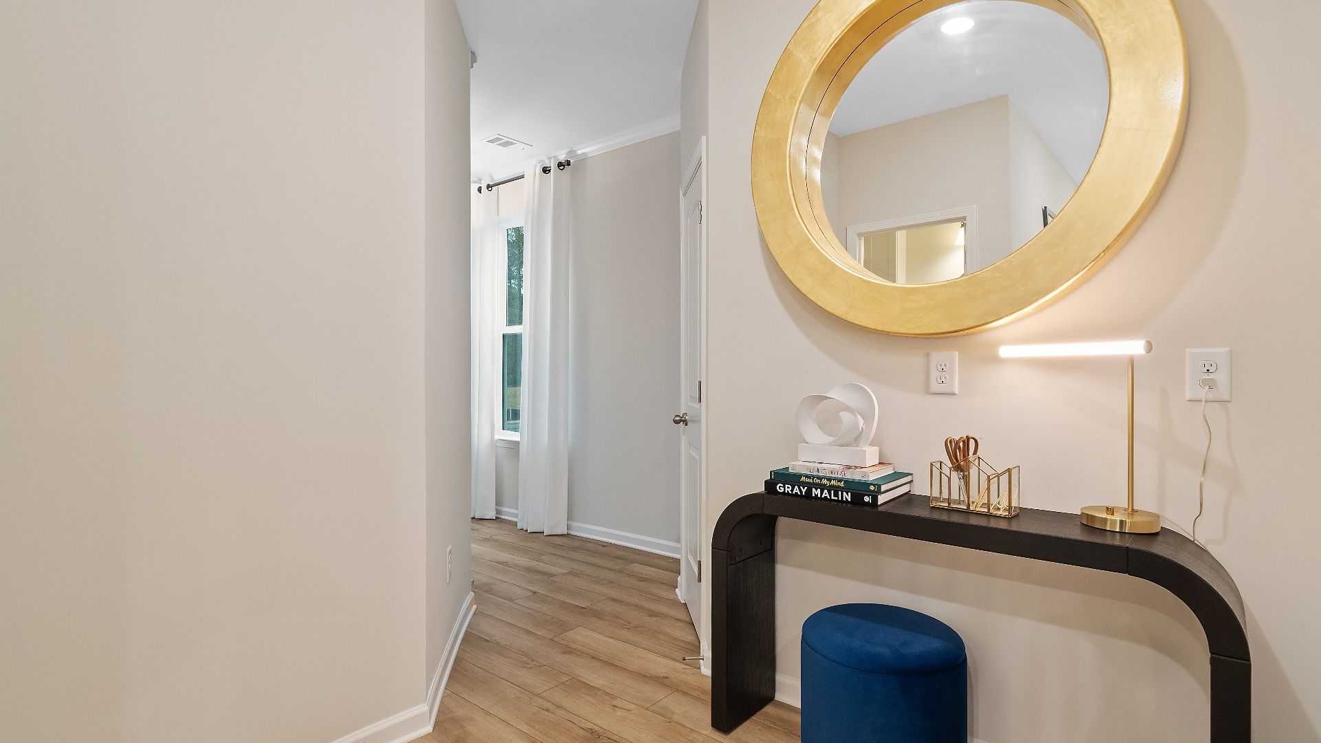 Stylish foyer entry in new townhome in Riverdale, GA featuring decorative trim and contemporary finishes.