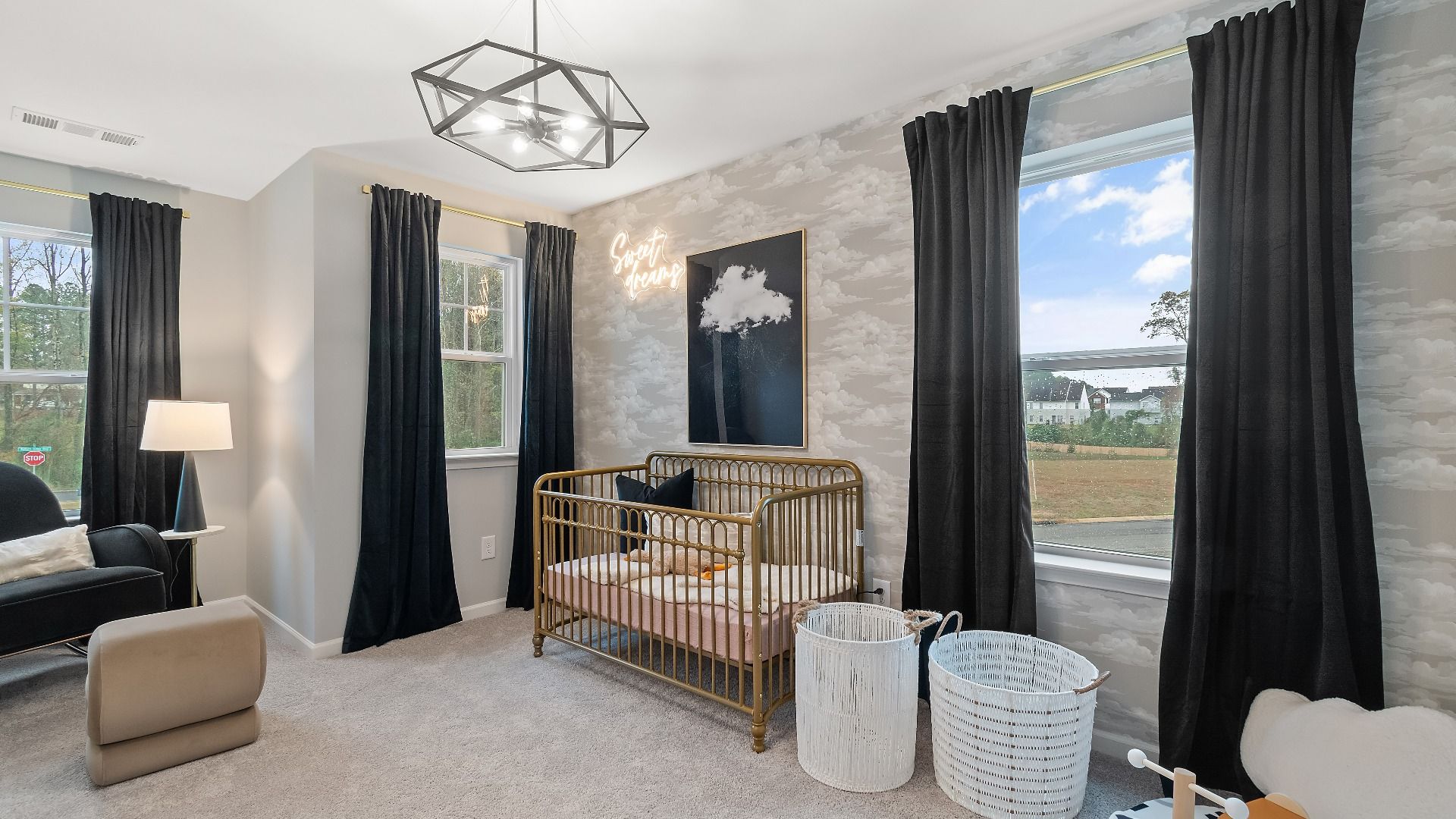 Kids bedroom with soft color scheme and many windows in new construction townhome in Riverdale, GA.