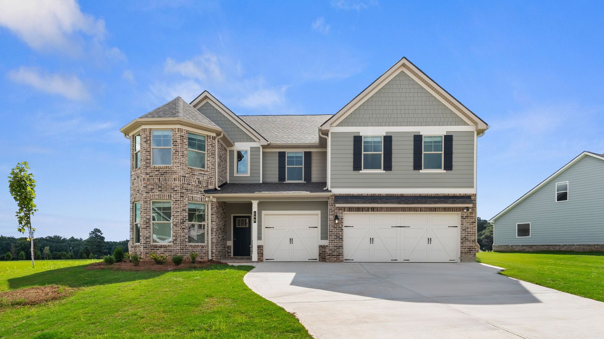 Isabella V two-story home with three-car garage at Grandview at Millers Mill in Stockbridge, GA.