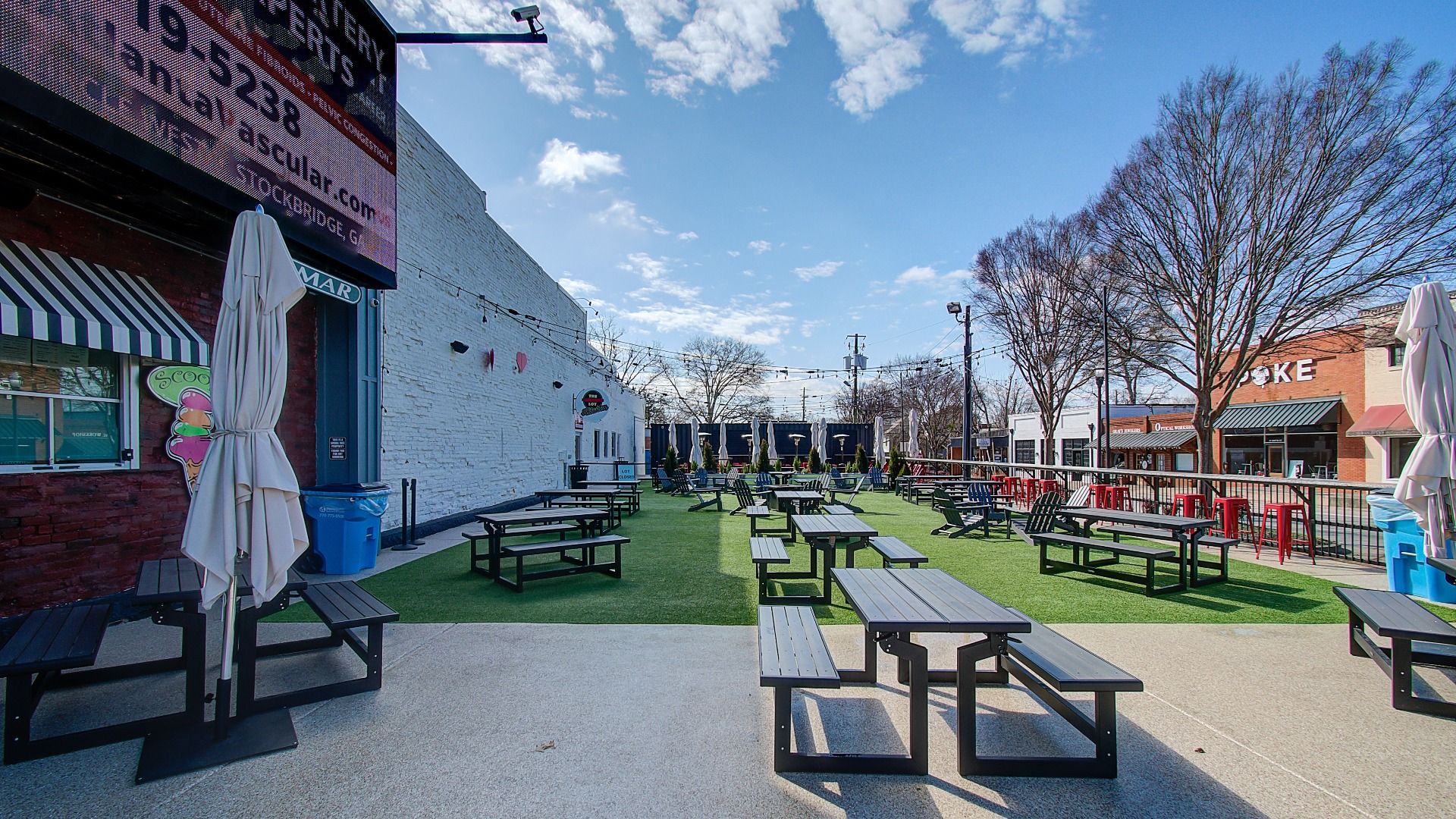 Popular ice cream shop, Scoops, with greenspace in Downtown McDonough Square.