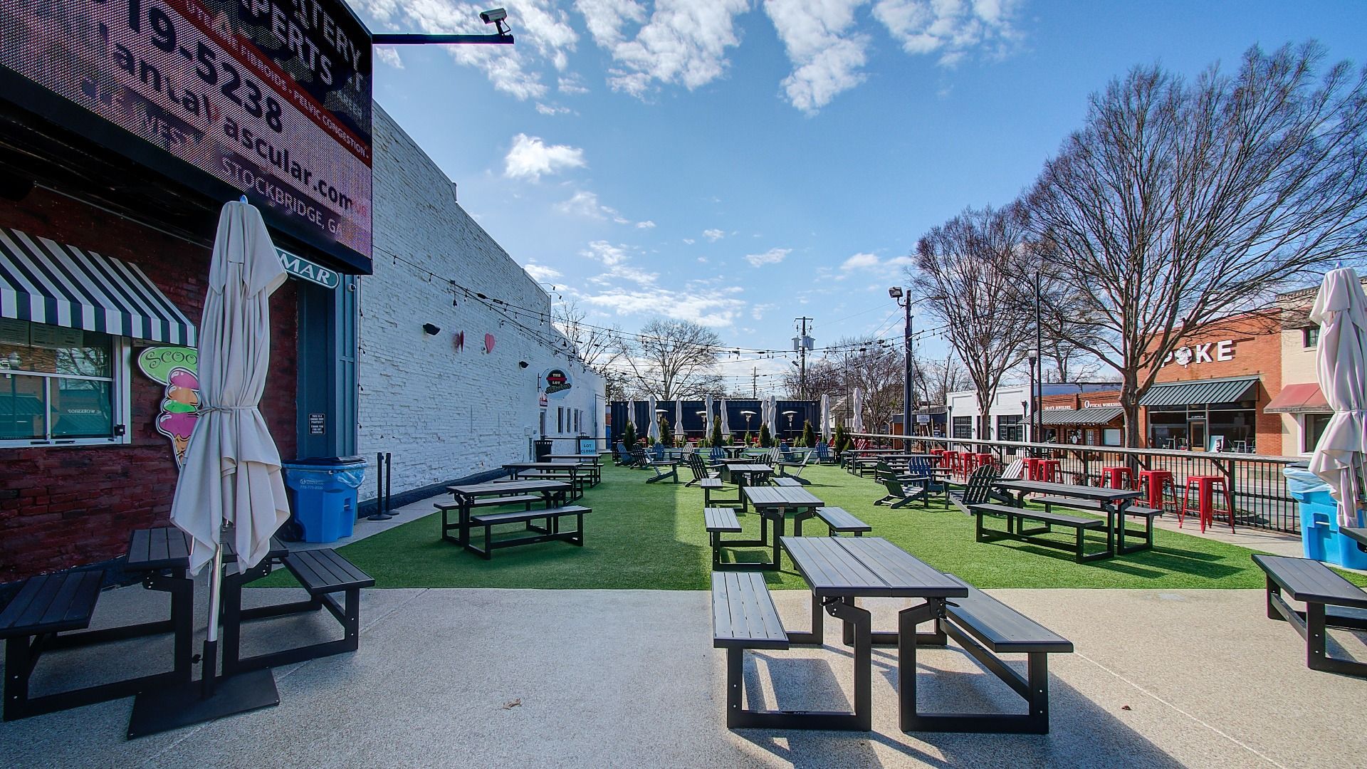 Popular ice cream shop, Scoops, with greenspace in Downtown McDonough Square.