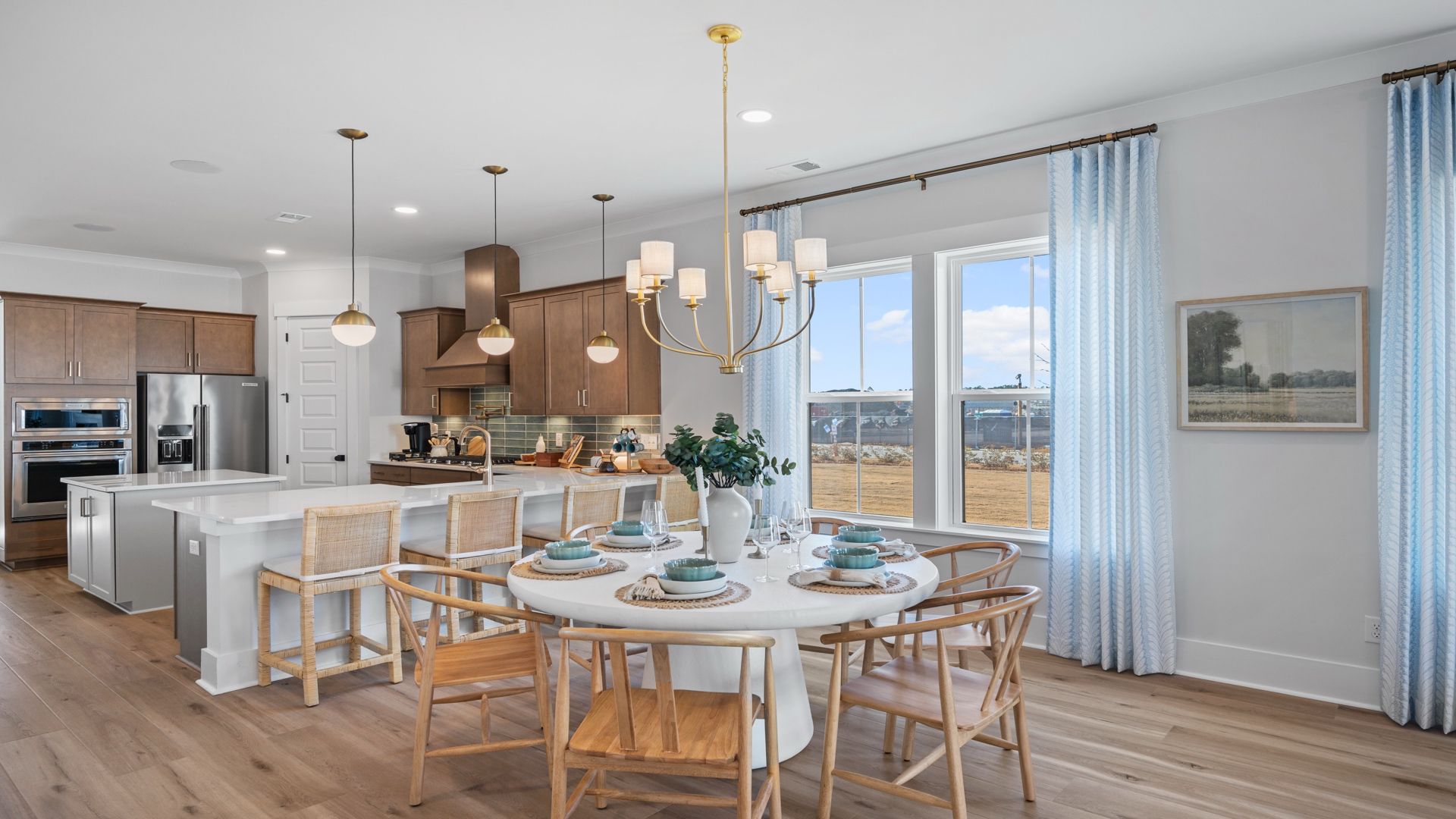 Model Home in Midtown at Nexton in by DRB homes offering an eat in area