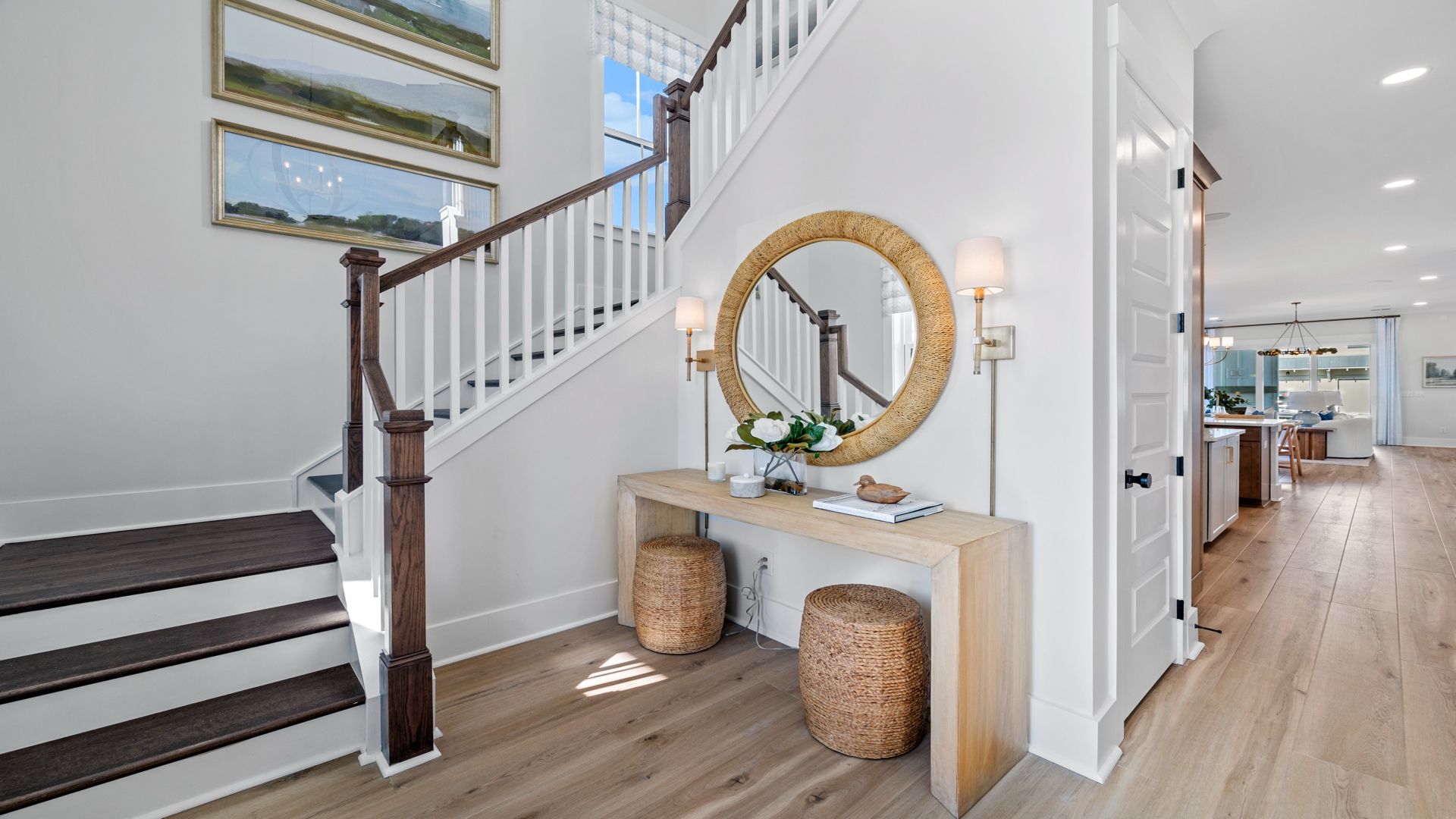 The Beaufain model in Midtown at Nexton by DRB homes offering a spacious foyer with lots of natural light