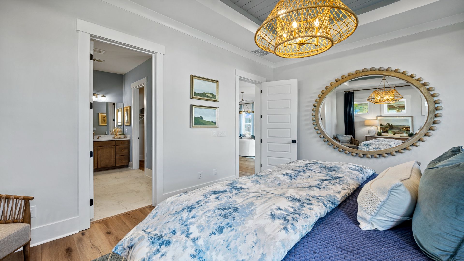 The primary suite at Midtown at Nexton by DRB homes offering the perfect open layout with lots of natural light