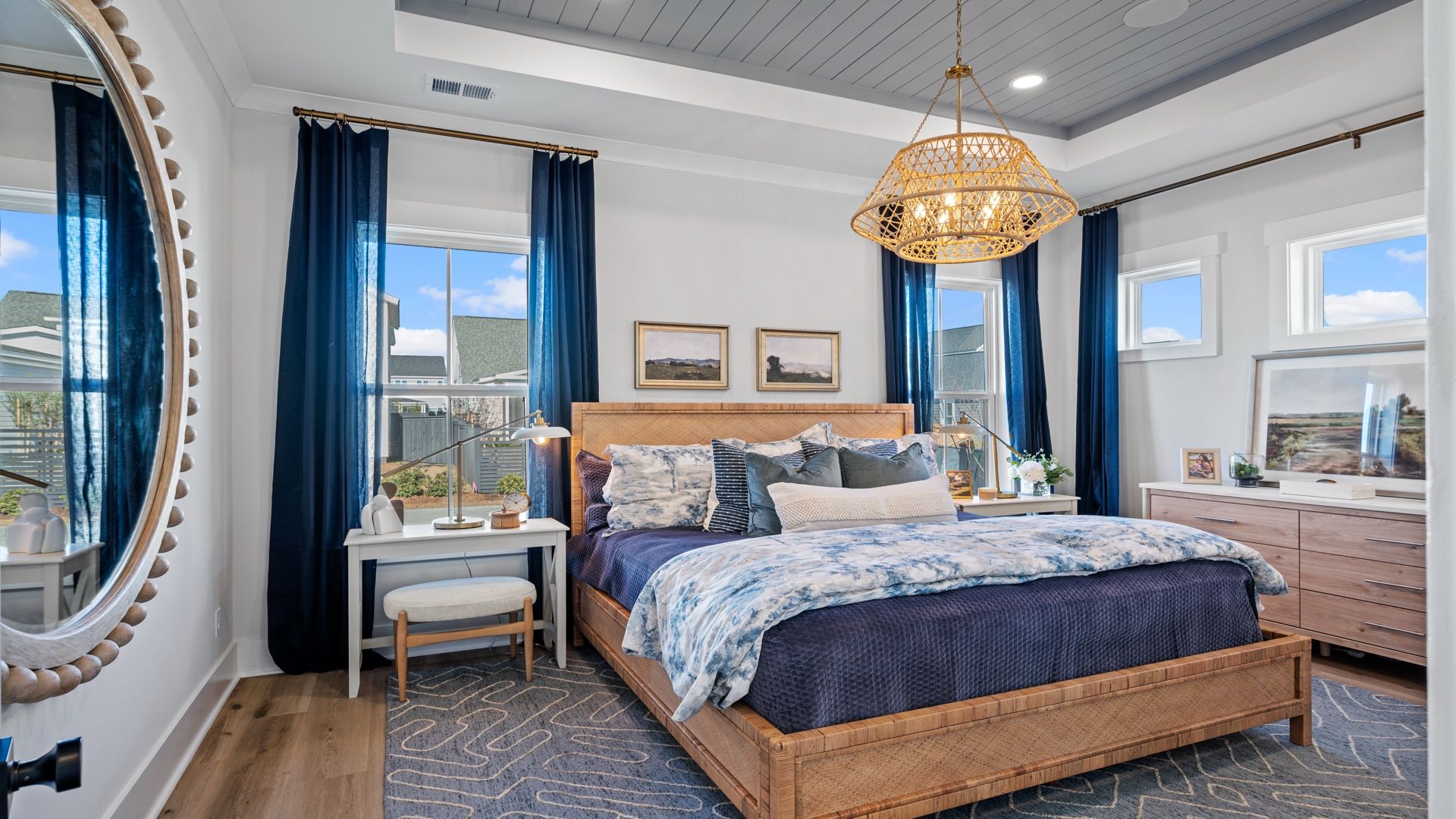 The primary suite at Midtown at Nexton by DRB homes offering the perfect open layout with lots of natural light
