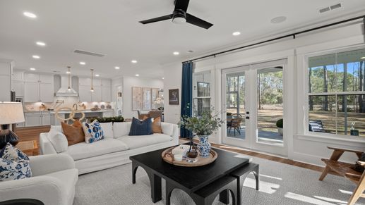Living Room- at Pamlico Terrace at by DRB Homes features an open layout with lots of natural lightening