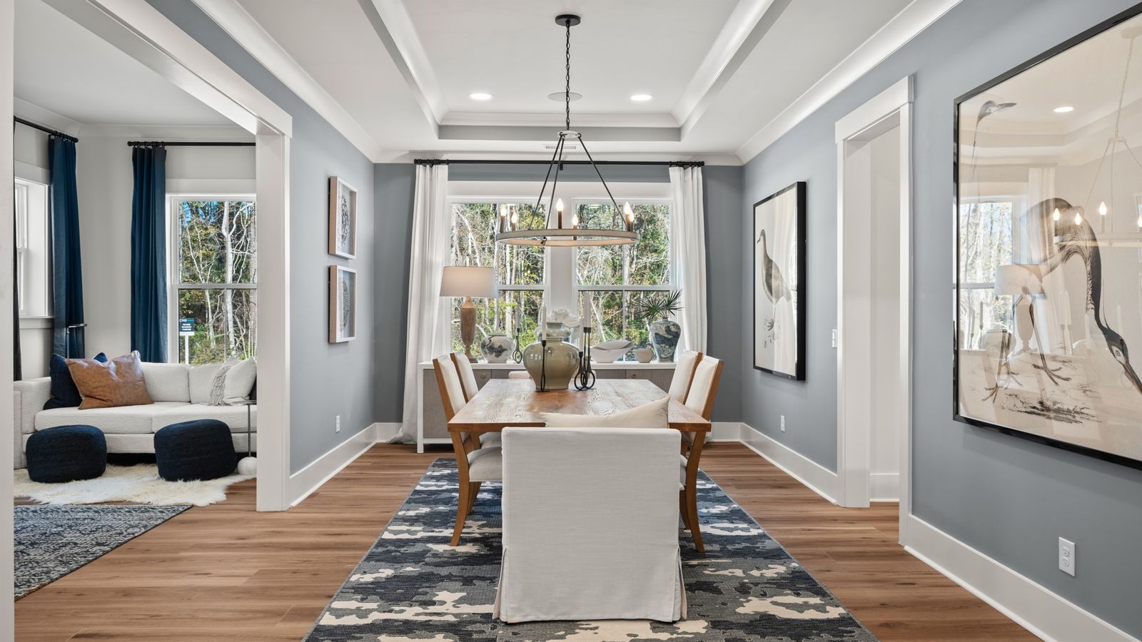 Dining Room- at Pamlico Terrace at by DRB Homes features a perfect dining room table for entertaining