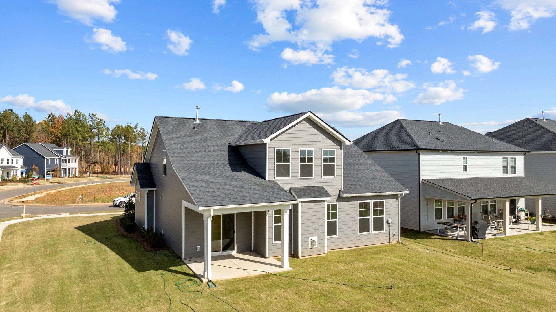Fairfield design rear elevation with covered rear porch at Lakeside Glen by premier builder DRB Homes, York, SC.
