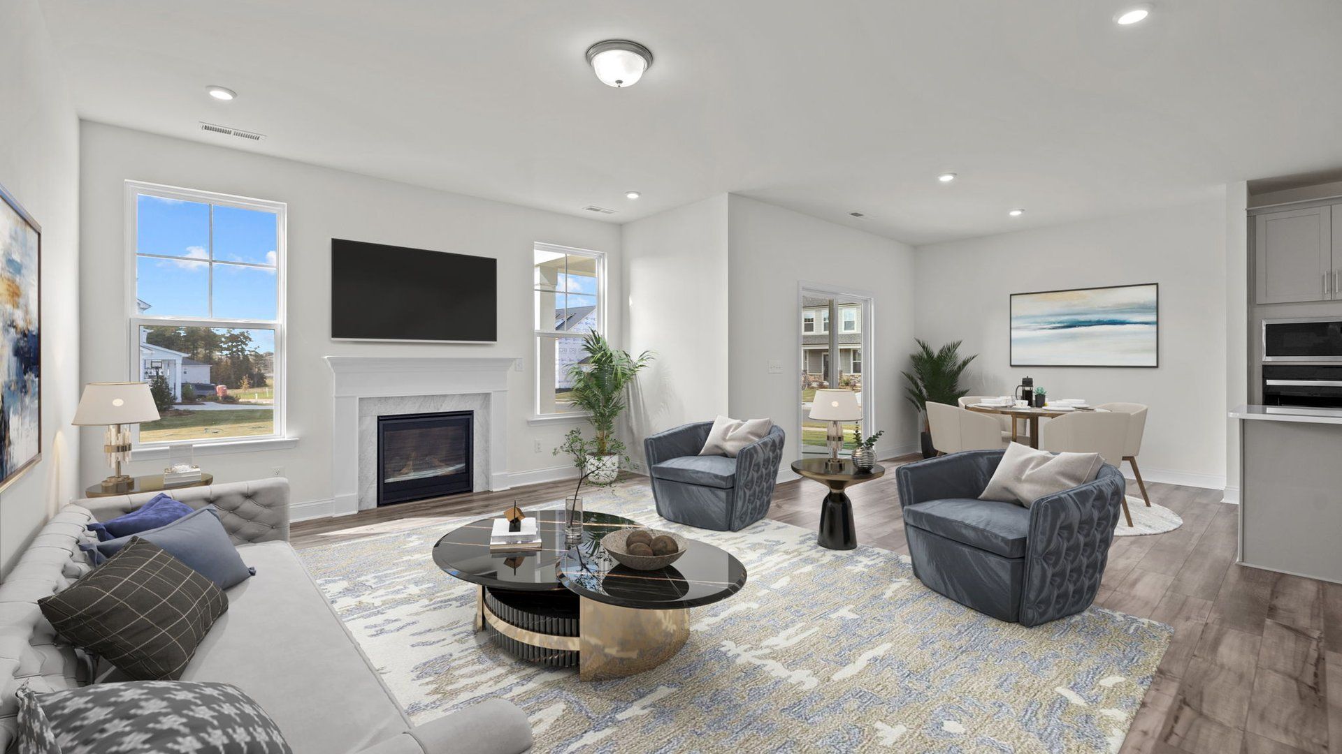 Fairfield open floor concept family room, eat-in breakfast, and gourmet kitchen, at Lakeside Glen by DRB Homes, York, SC.