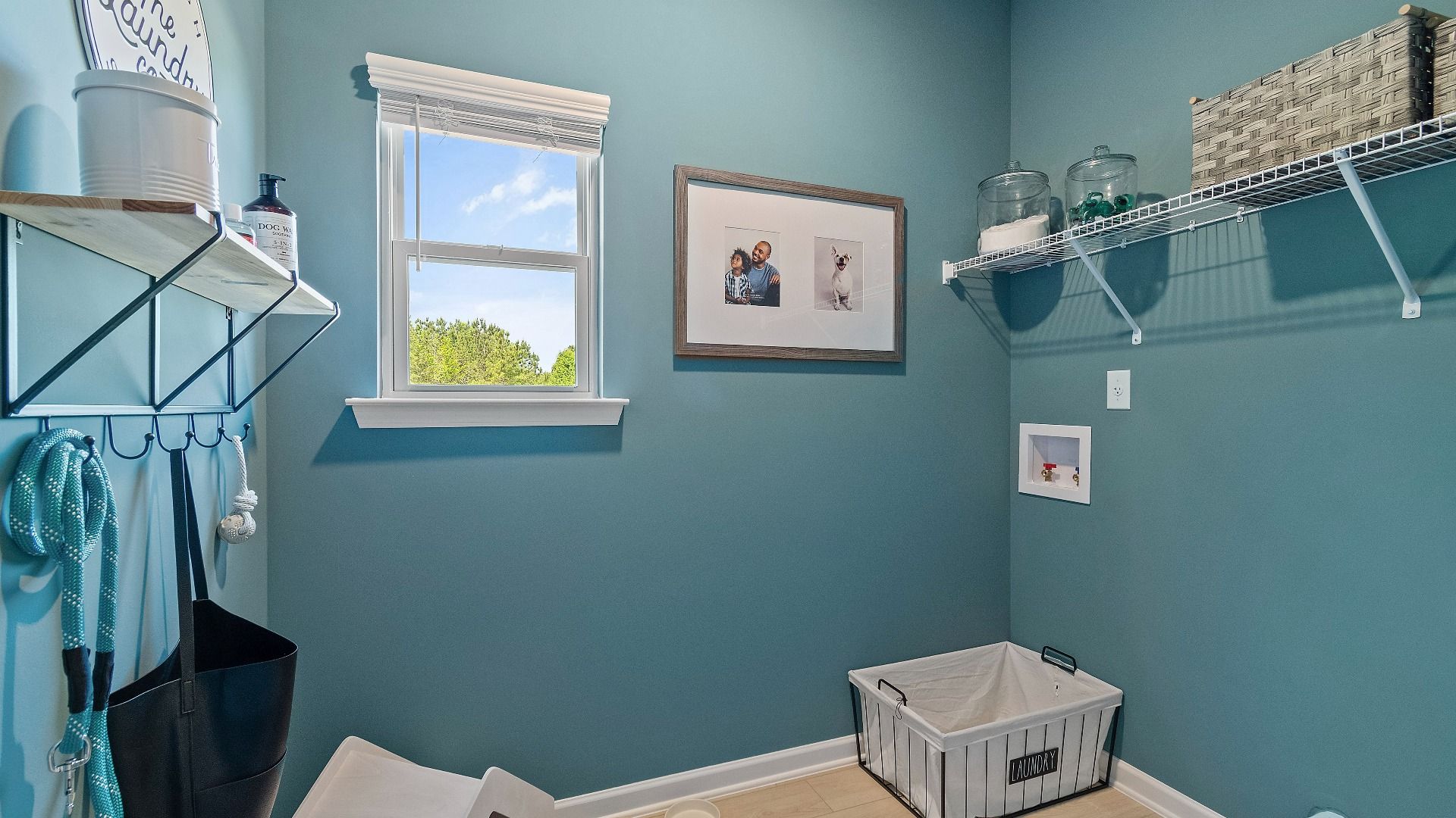 Reagan mud room featuring shelves and abundant storage space at Abbotts Crossing.