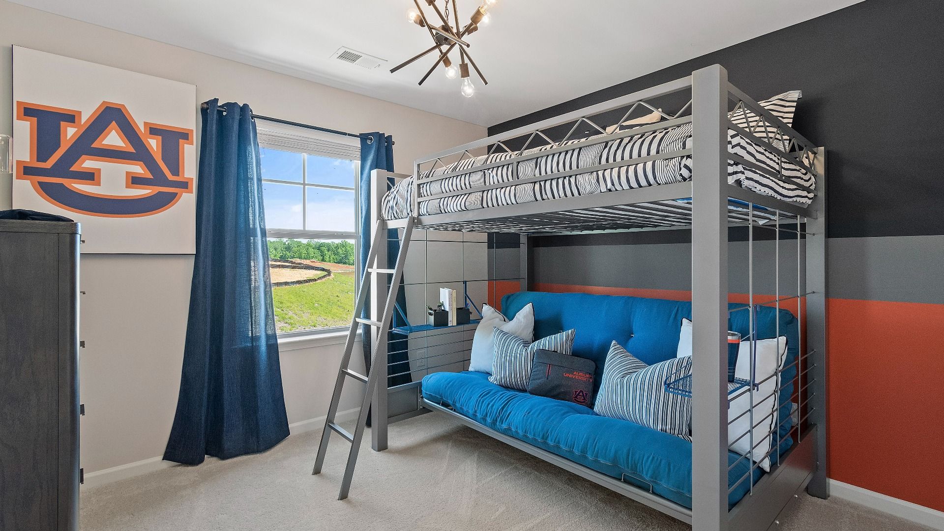 Secondary bedroom in Reagan floorplan with carpet flooring and large window for natural light at Abbotts Crossing.