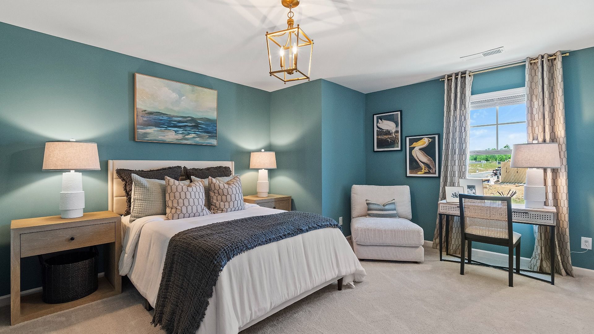 Secondary bedroom in Reagan floorplan generously-sized for seating area and modern finishes at Abbotts Crossing.