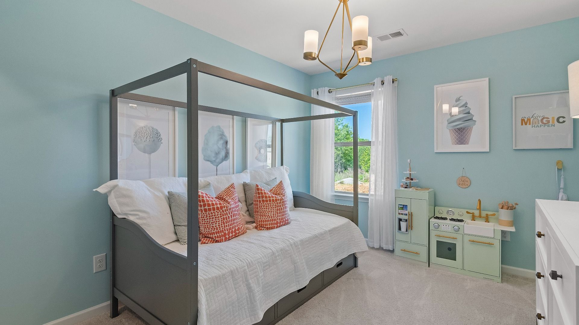 Secondary bedroom with carpet flooring and window for natural light at Abbotts Crossing in Reagan floorplan.
