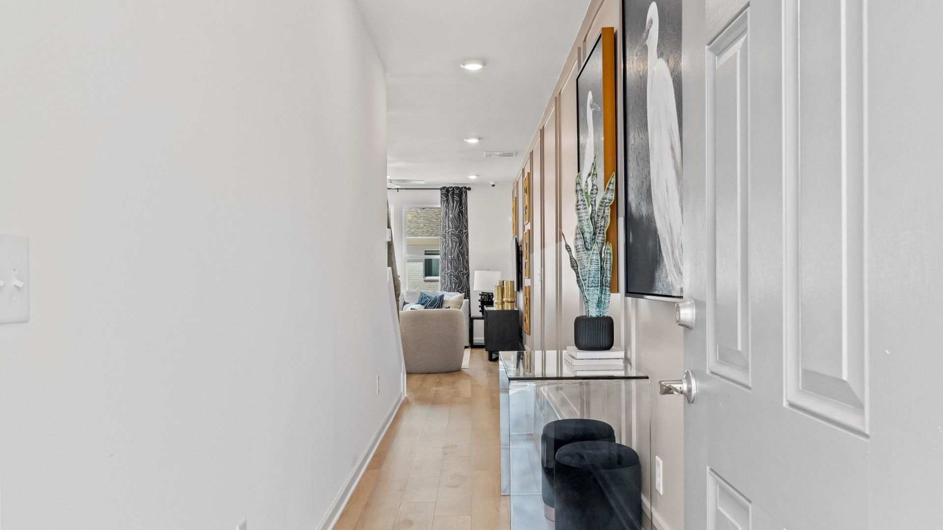 Austin Alternate entryway into modern townhome with LVP flooring at Bowers Farm Townhomes in McDonough, GA.