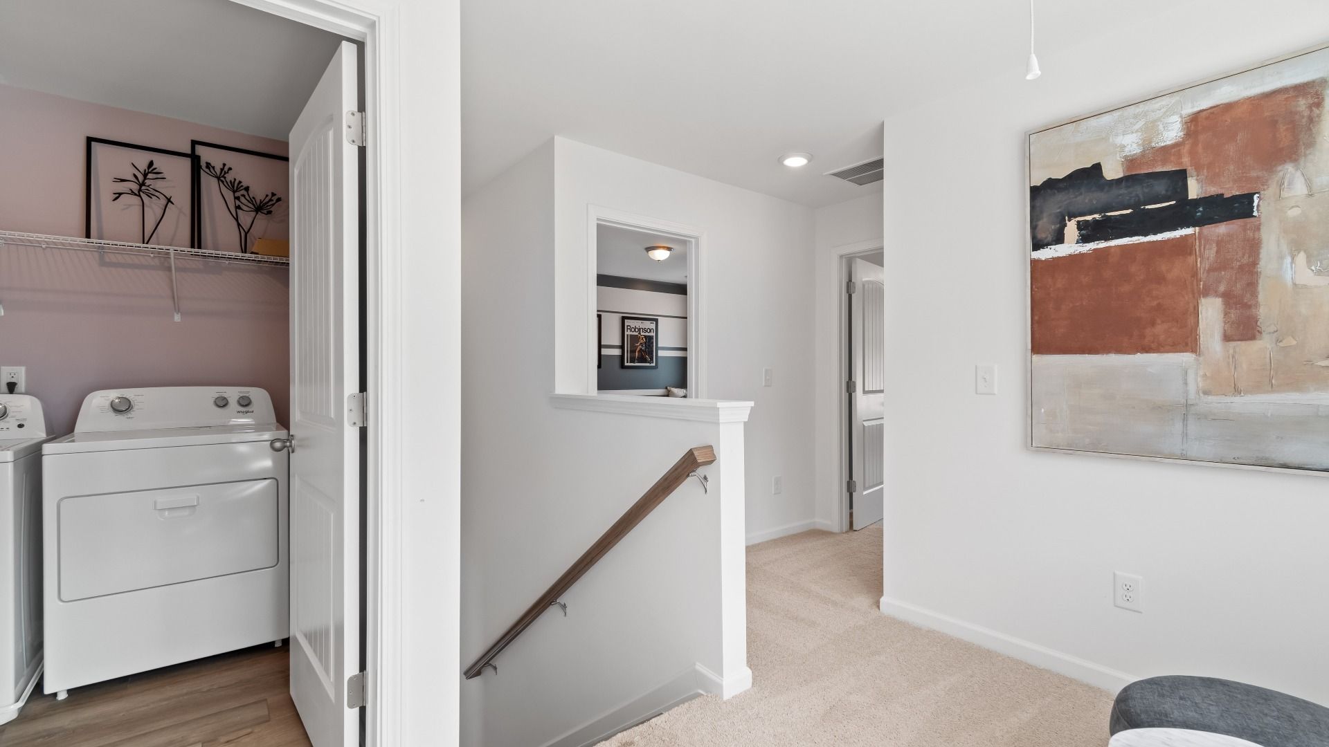 Austin Alternate upstairs landing with access to laundry room and loft at Bowers Farm townhomes in McDonough, GA.