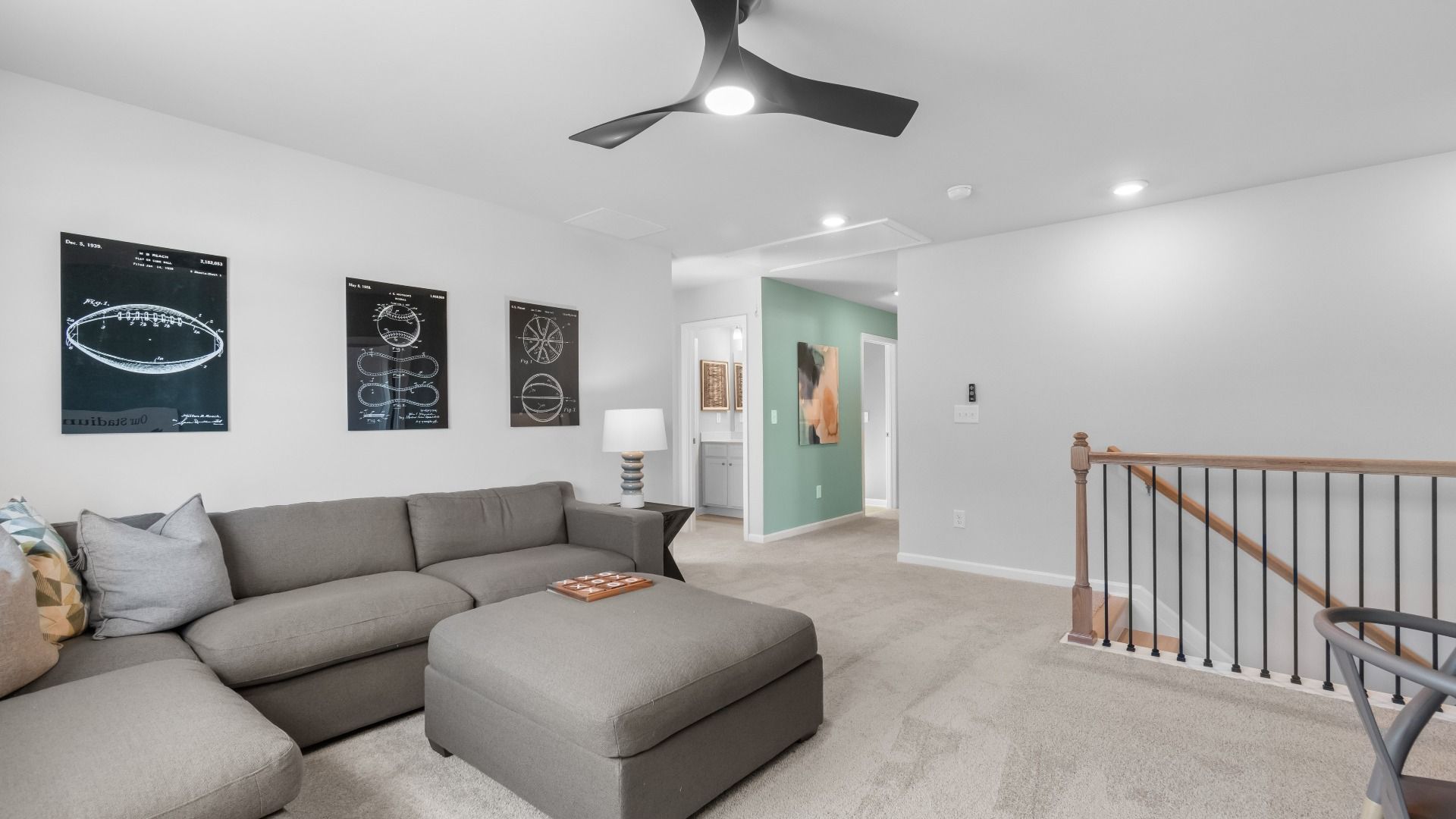 Ridgewood open loft with carpet flooring and flexible space at Burchwood in Stockbridge, GA.
