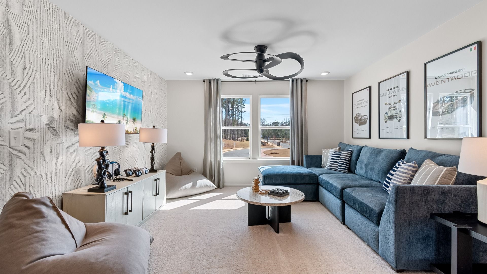 Spacious open Wynwood loft for versatile use with carpet flooring and natural light at Bowers Farm in McDonough, GA.