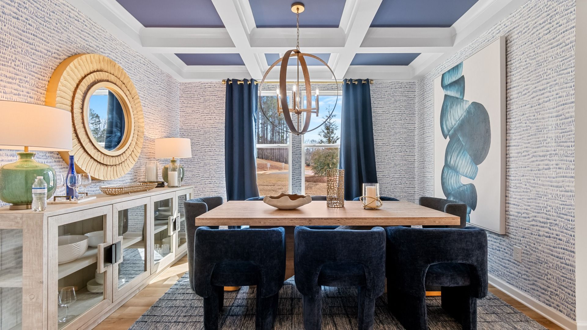 Elegant dining room featuring modern design, coffered ceiling, and large window at Bowers Farm in McDonough, GA.