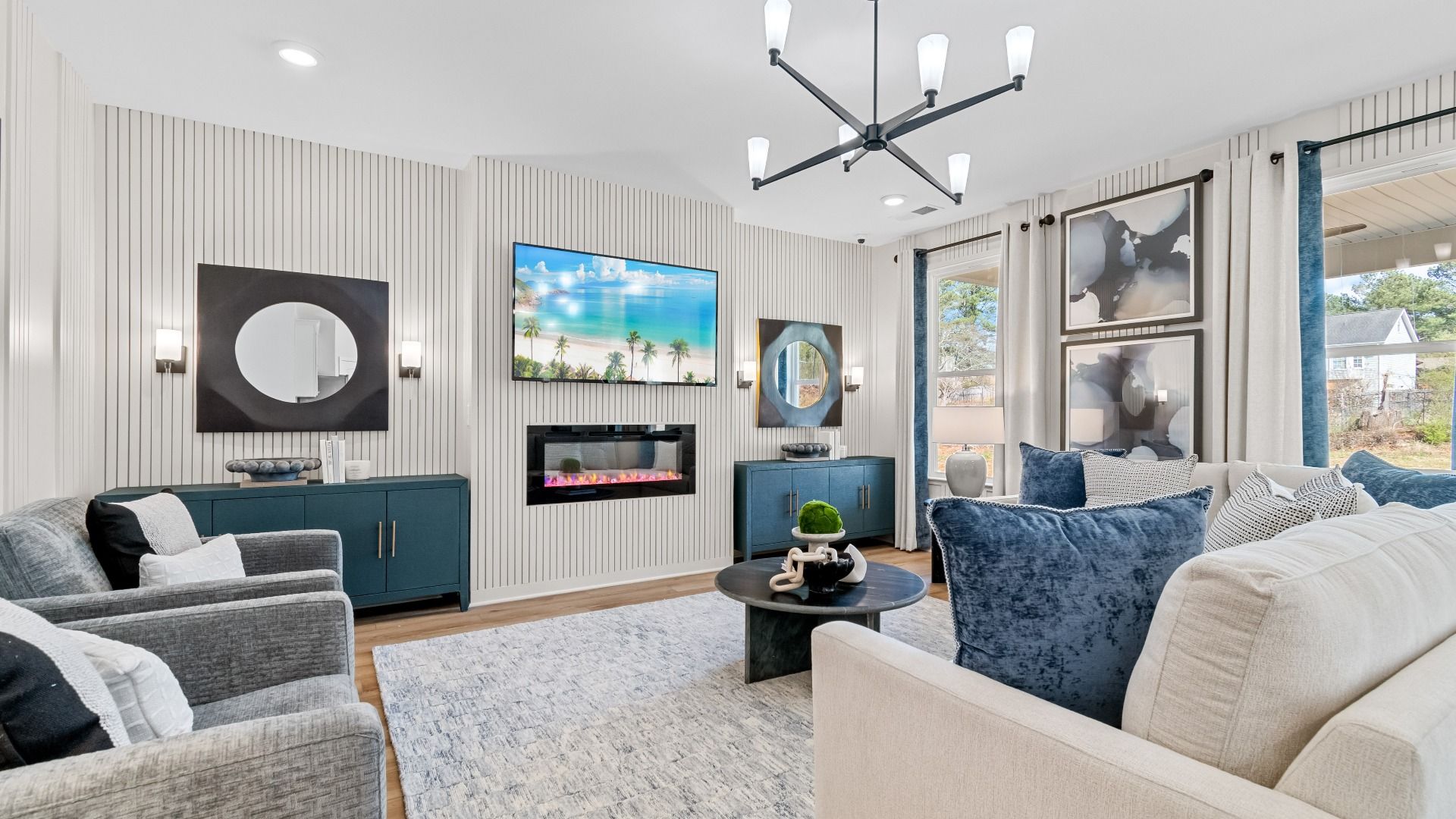 Spacious family room with natural light and modern designs in new construction single family home in McDonough, GA.