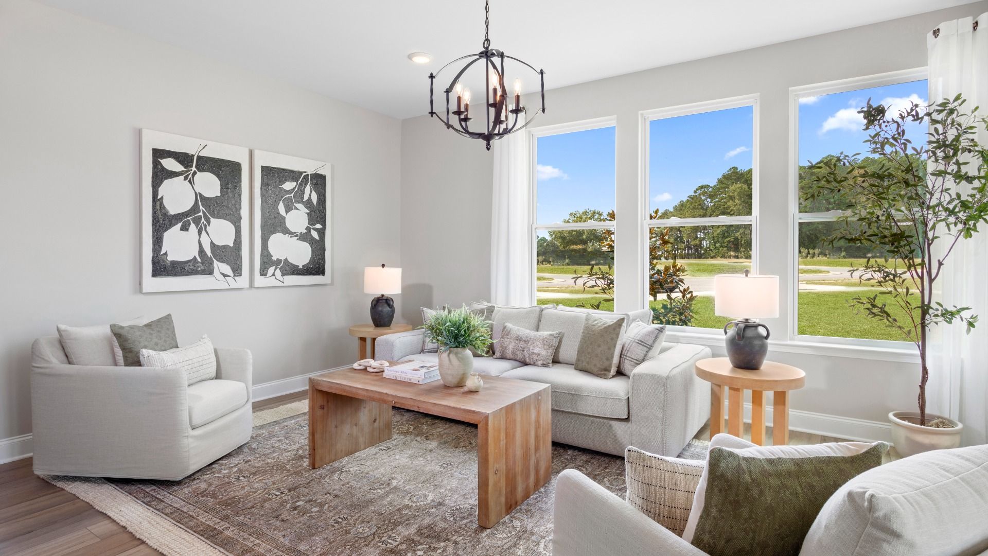 Spacious and bright family room with large windows in The Litchfield Design at Bell Glen by DRB Homes Charlotte, NC