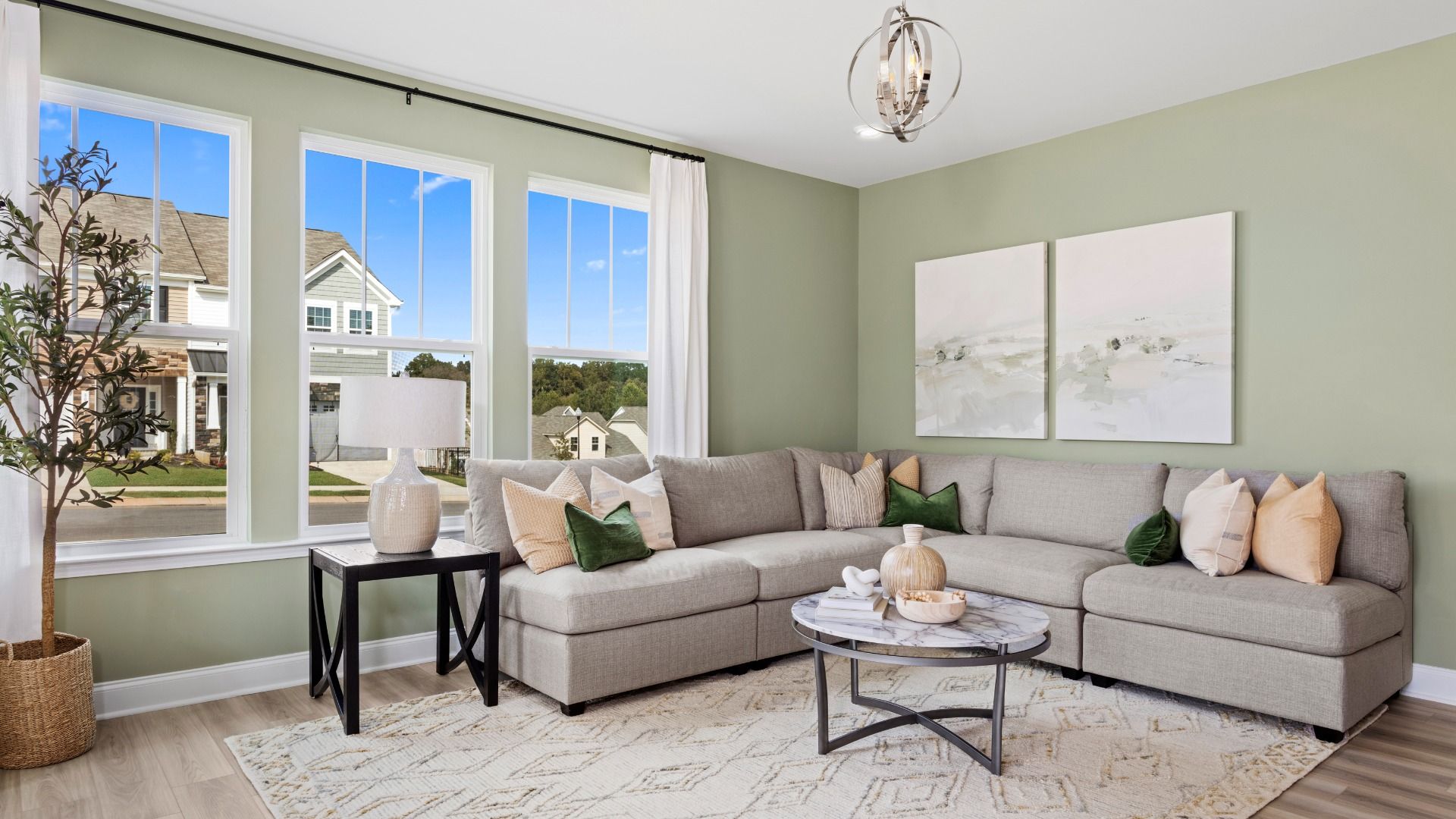 Ample family room with large windows in the Litchfield Design at Bell Glen by DRB Homes Charlotte, NC