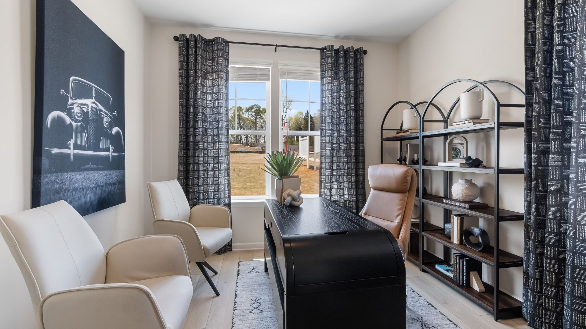 Functional home office space with large window for abundant natural light at Daybreak in Newnan, GA.